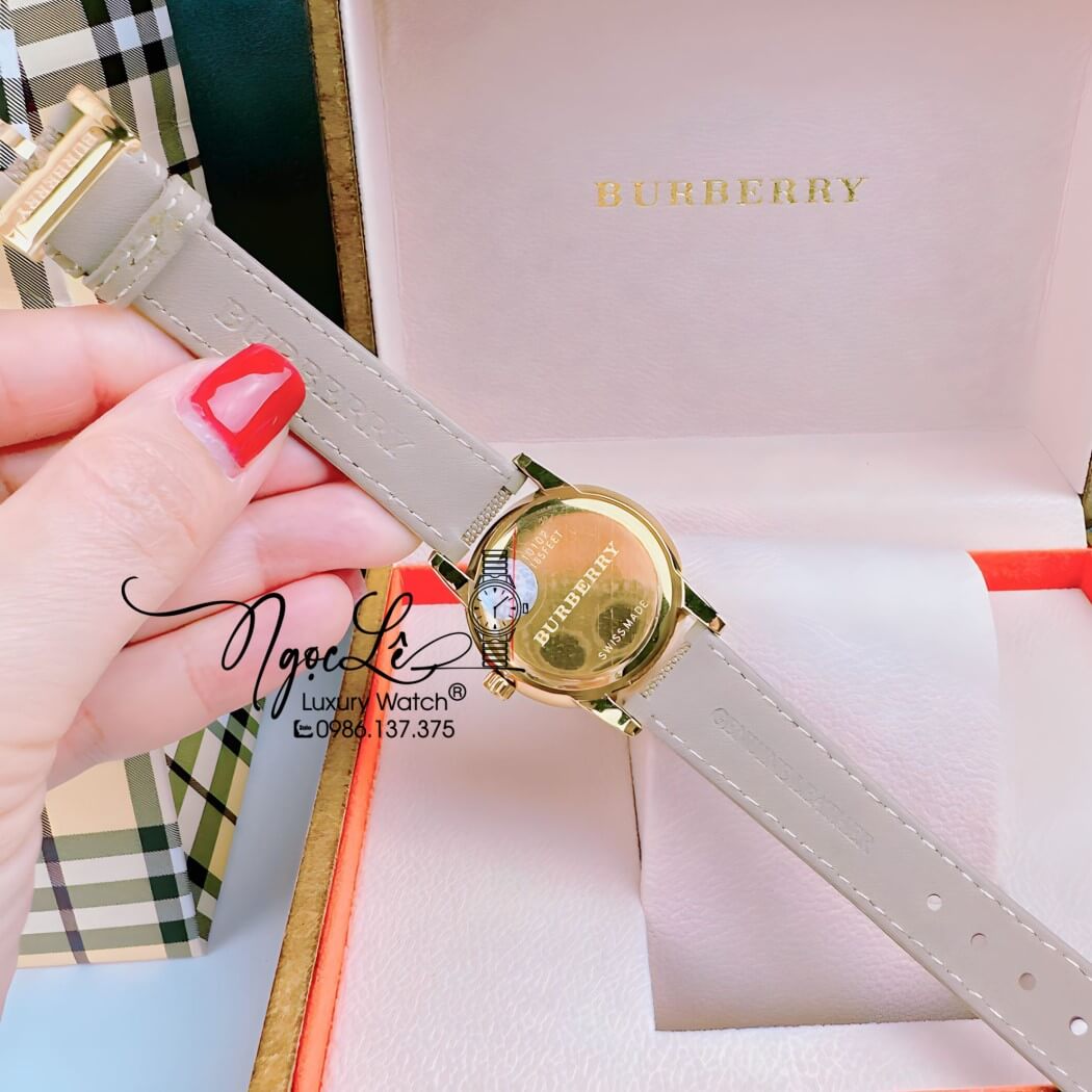 Đồng Hồ Burberry Nữ Dây Da Kẻ Sọc Caro Màu Nude Mặt Vàng Size 32mm