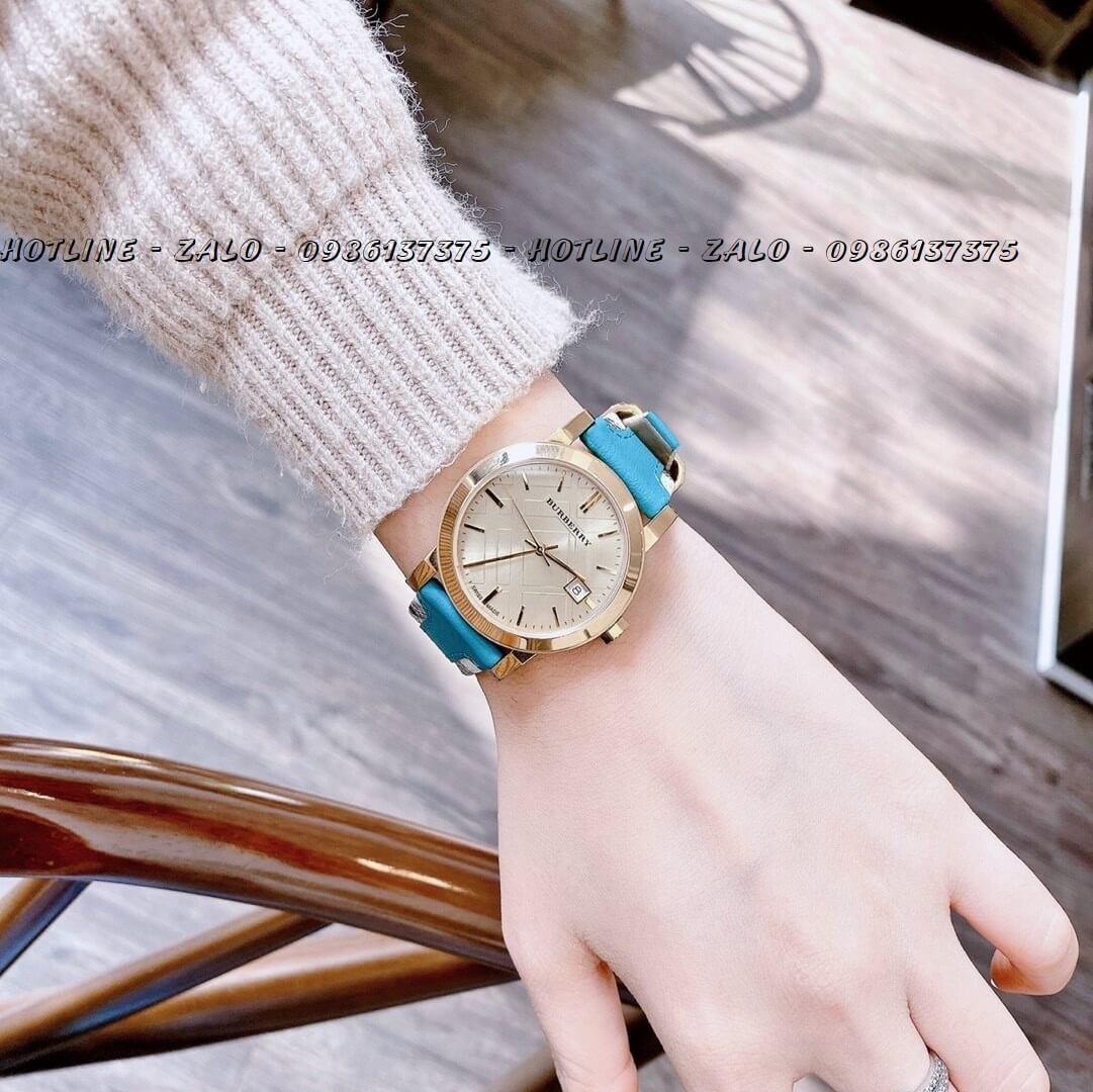 Đồng Hồ Burberry Nữ Dây Da Xanh Bọc Caro 34mm