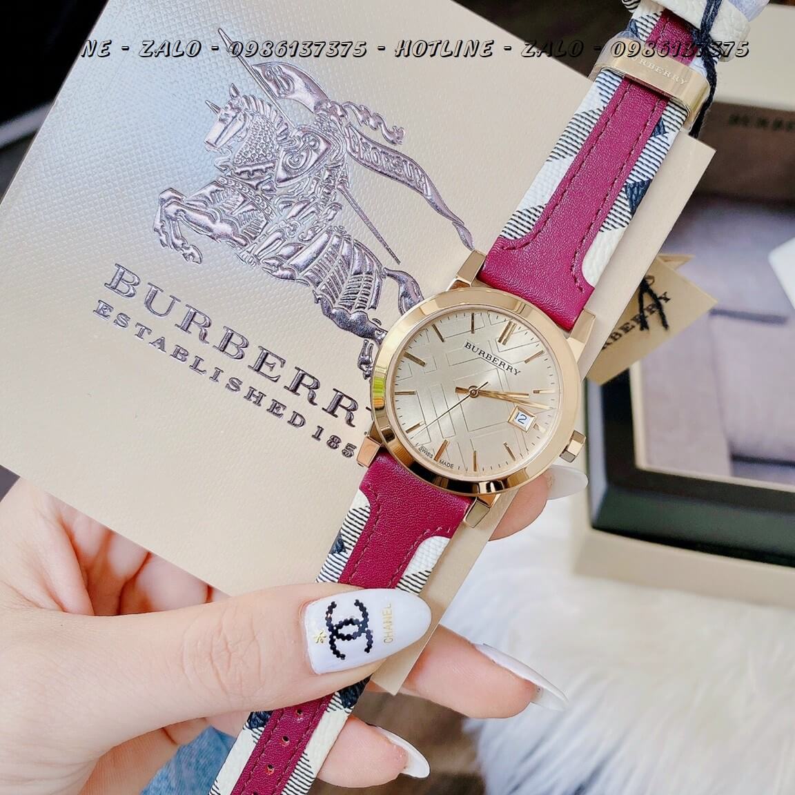 Đồng Hồ Burberry Nữ Dây Da Đỏ Mận Bọc Caro Gold