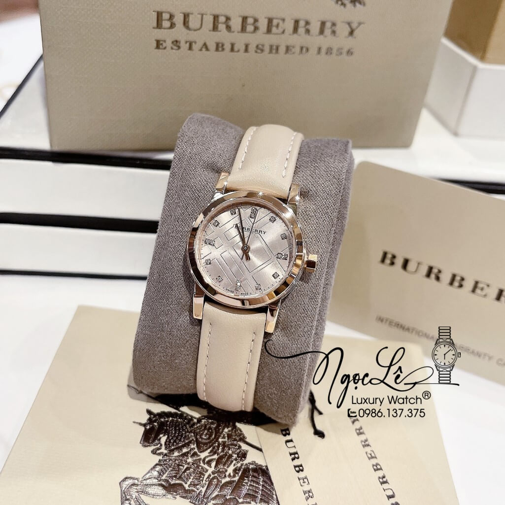 Đồng Hồ Burberry Nữ Dây Da Màu Nude Vỏ Rose Mặt Hột Cao Cấp 28mm