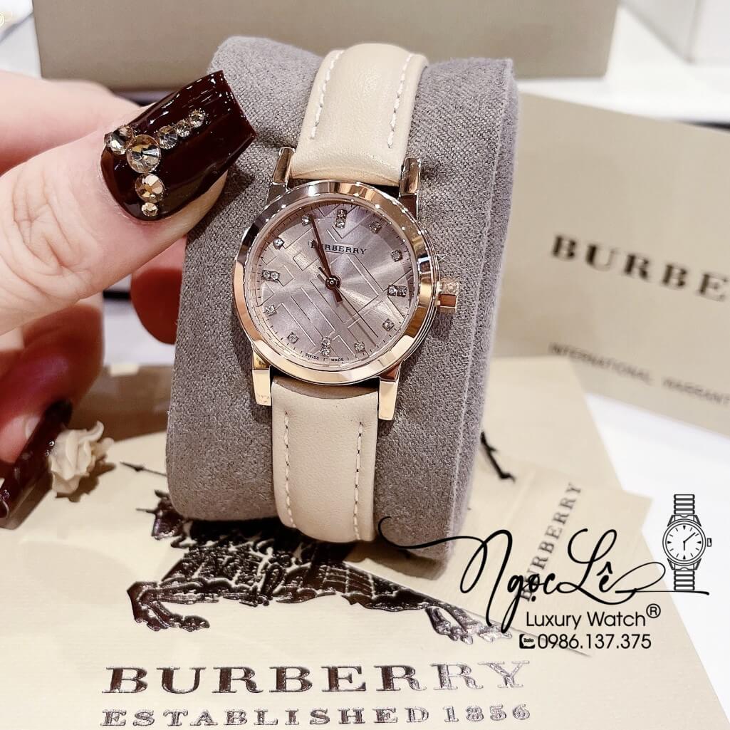 Đồng Hồ Burberry Nữ Dây Da Màu Nude Vỏ Rose Mặt Hột Cao Cấp 28mm