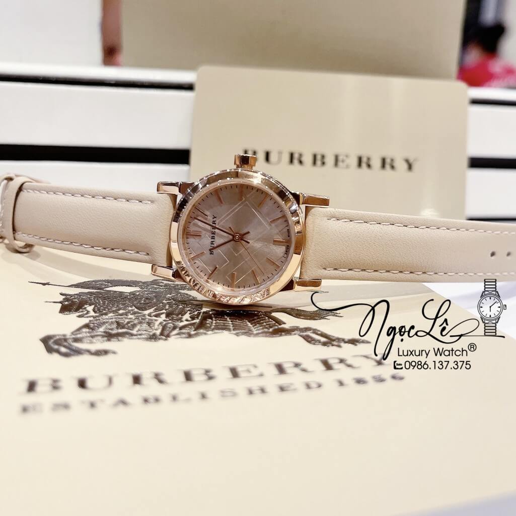 Đồng Hồ Burberry Nữ Dây Da Màu Nude Vỏ Rose Mặt Vạch Cao Cấp 28mm