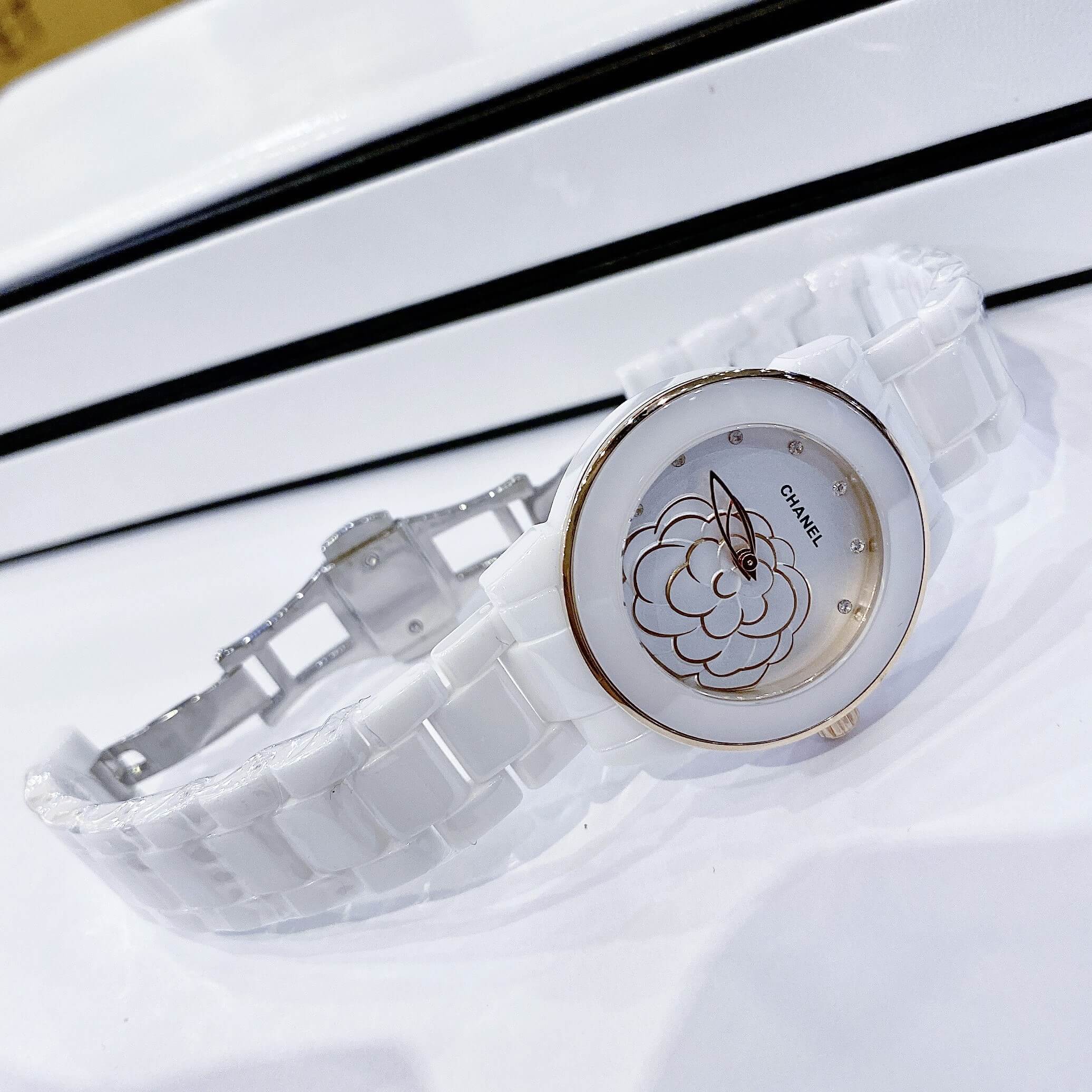 Đồng Hồ Nữ Chanel J12 Dây Đá Ceramic Trắng Mặt Hoa 3D Viền Rose Size 33mm