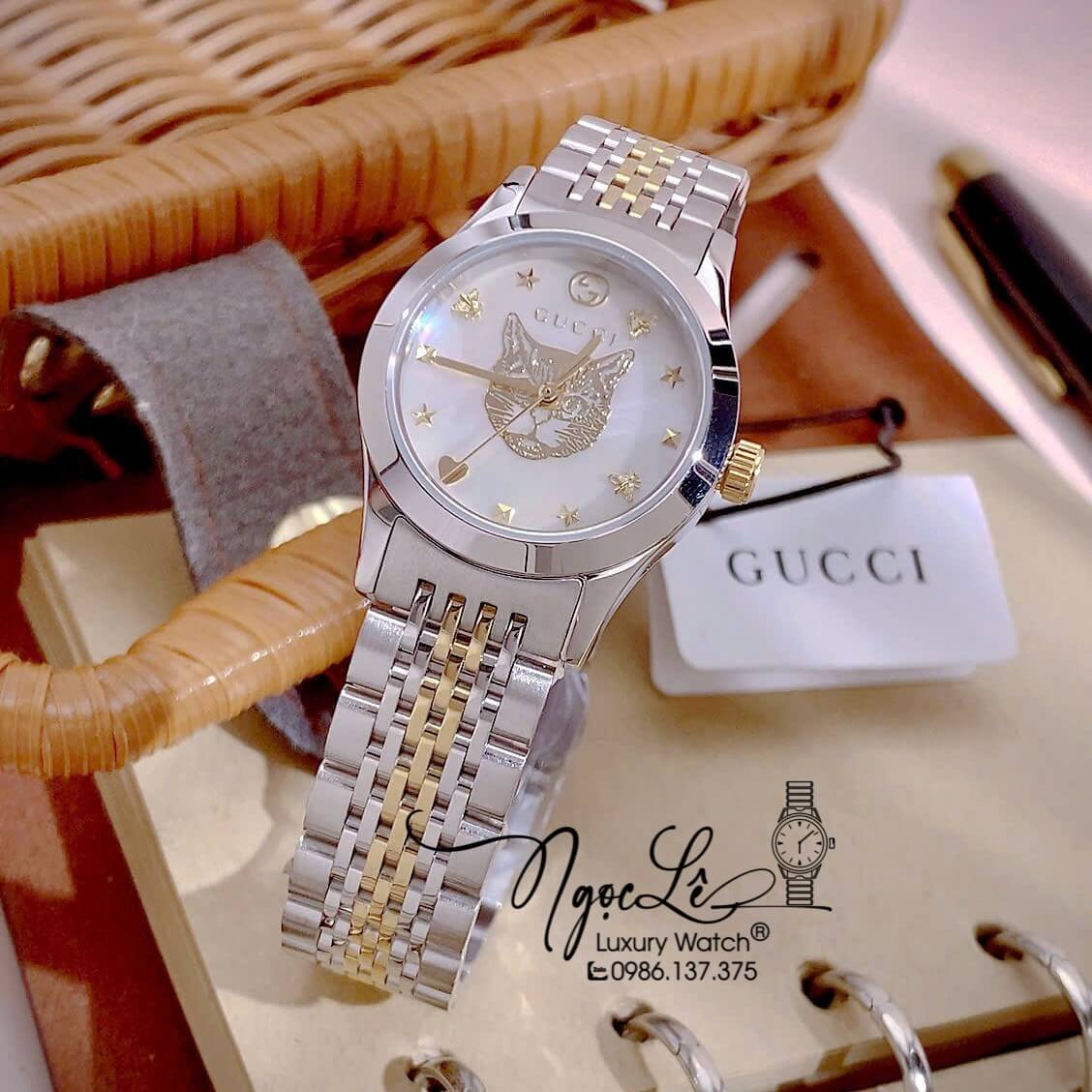 Đồng Hồ Gucci G-Timeless Mystic Cat Motif Dây Demi Vàng Mặt Trắng Size 28mm