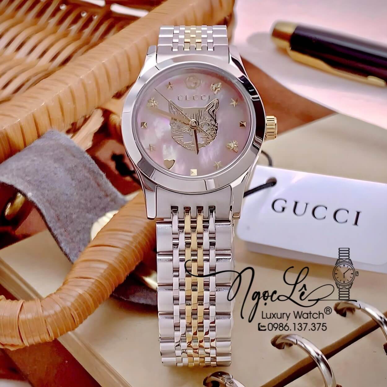 Đồng Hồ Gucci G-Timeless Mystic Cat Motif Dây Demi Vàng Mặt Hồng Size 28mm