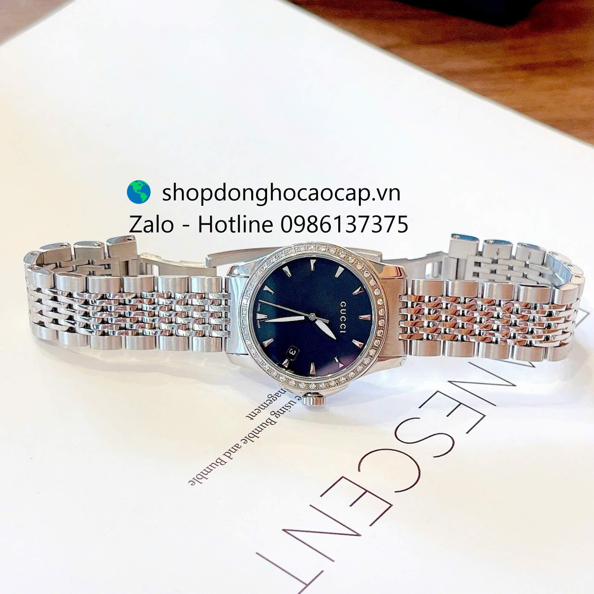 Đồng hồ Gucci nữ dây thép bạc mặt đen viền đá size 28mm - Gucci G-Timeless Quartz