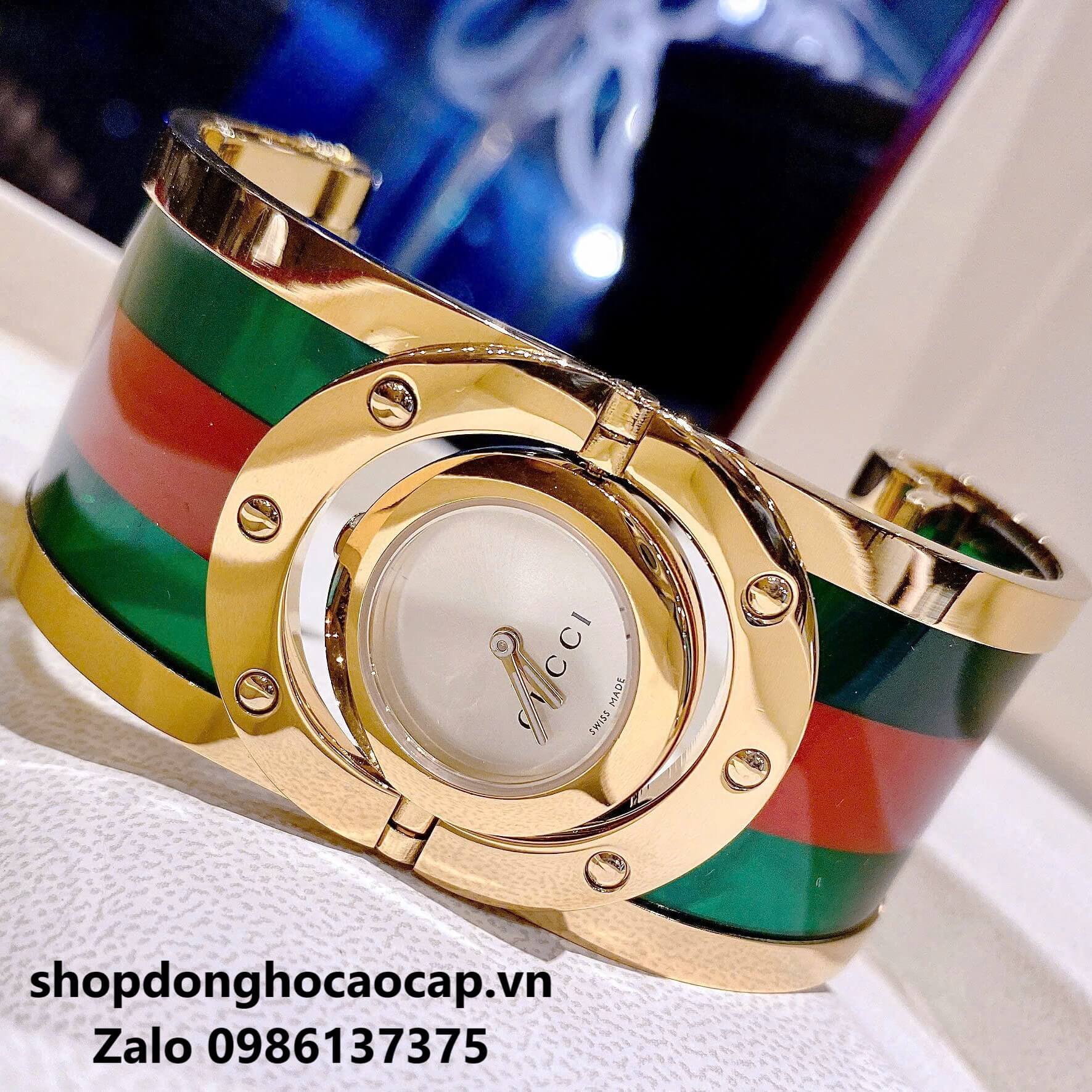 Đồng Hồ Gucci Twirl Nữ Dáng Lắc Tay Màu Vàng Gold Mix Xanh Cao Cấp Size 23mm