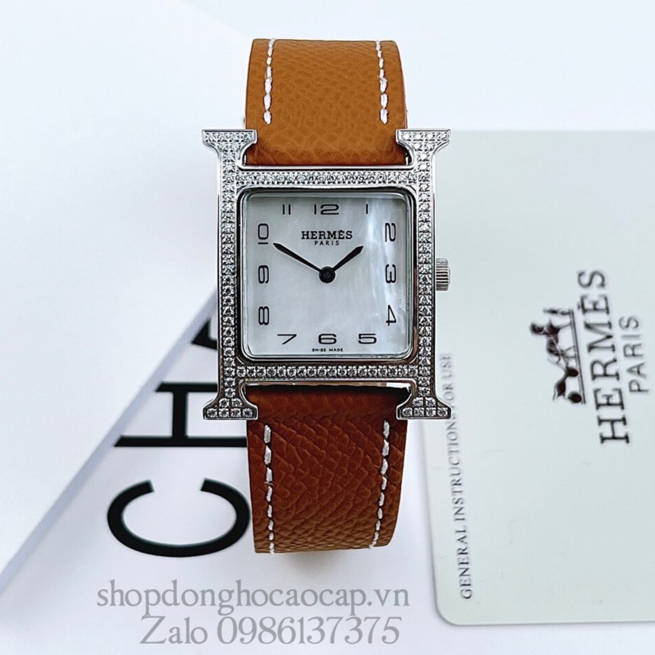 Đồng Hồ Hermes Heure H Nữ Dây Da Nâu Bò Silver 26x26mm