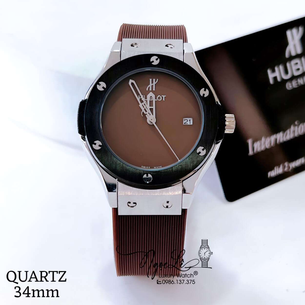 Đồng Hồ Hublot Classic Fusion Nữ Dây Silicon Nâu Niềng Trơn Vỏ Thép Đen Size 34mm