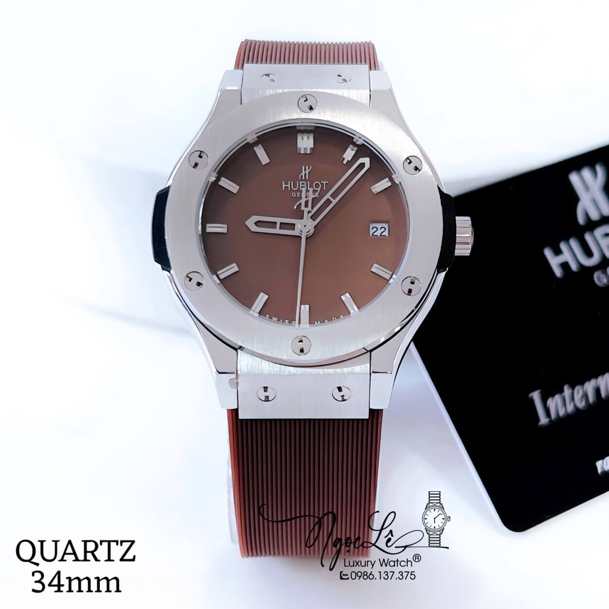 Đồng Hồ Hublot Classic Fusion Nữ Dây Silicon Nâu Niềng Trơn Vỏ Silver Size 34mm