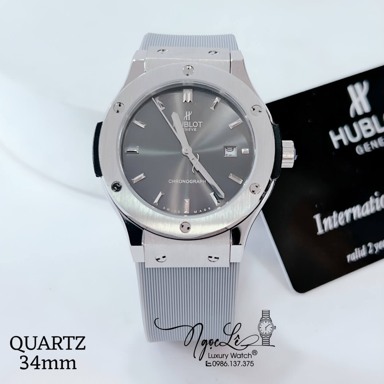 Đồng Hồ Hublot Classic Fusion Nữ Dây Silicon Xám Niềng Trơn Vỏ Silver Size 34mm