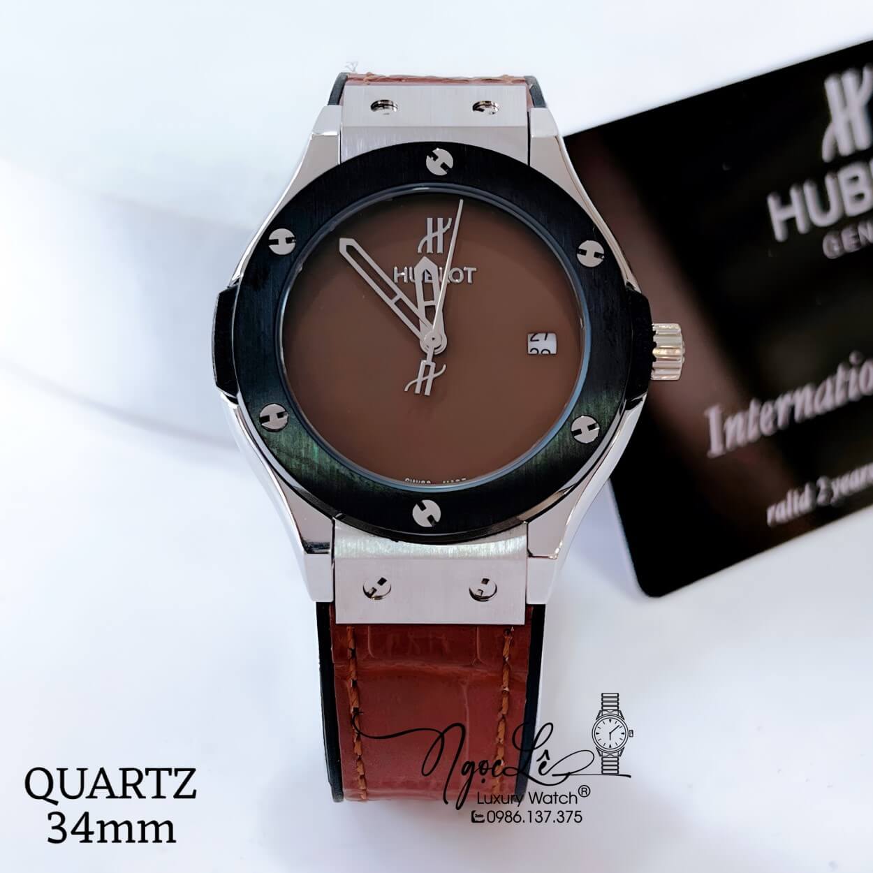 Đồng Hồ Hublot Classic Fusion Nữ Dây Da Silicon Nâu Niềng Trơn Vỏ Thép Đen Size 34mm