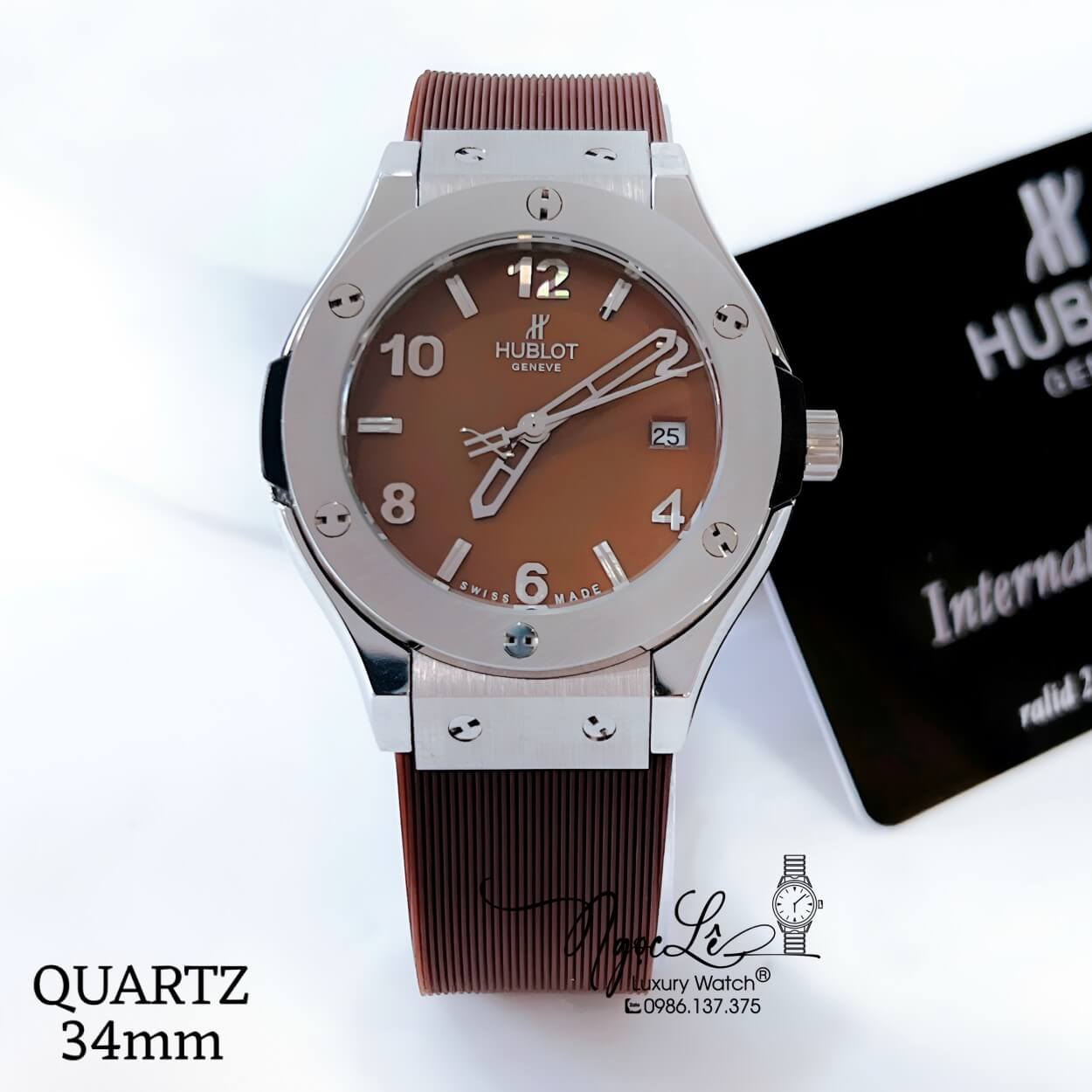 Đồng Hồ Hublot Classic Fusion Nữ Dây Da Silicon Nâu Niềng Trơn Vỏ Thép Mờ Size 34mm