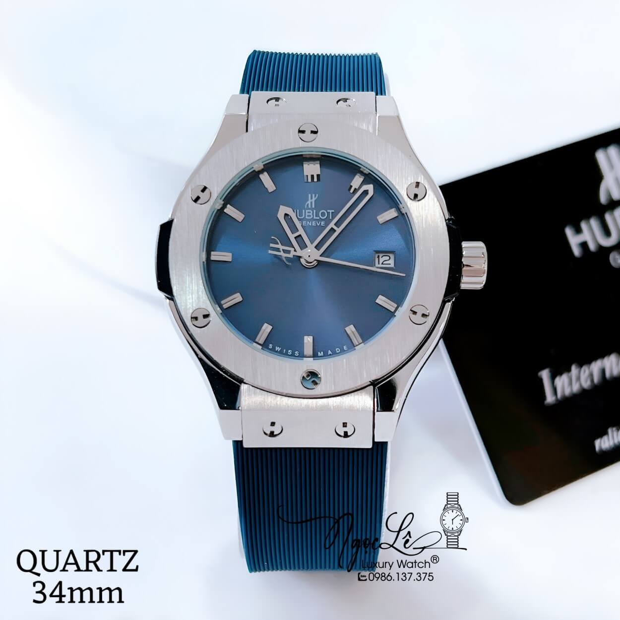 Đồng Hồ Hublot Classic Fusion Nữ Dây Silicon Xanh Navy Niềng Trơn Vỏ Silver Size 34mm