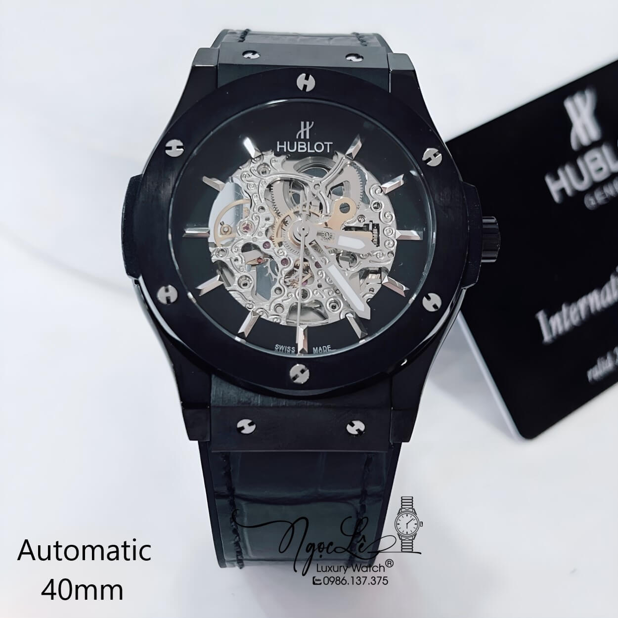 Đồng Hồ Hublot Nam Tự Động Lộ Máy Dây Da Silicon Đen Vỏ Thép Đen Size 41mm