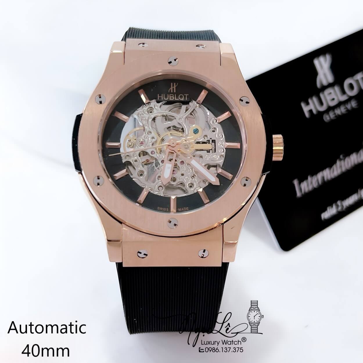 Đồng Hồ Hublot Nam Tự Động Lộ Máy Dây Silicon Đen Vỏ Rose Size 41mm