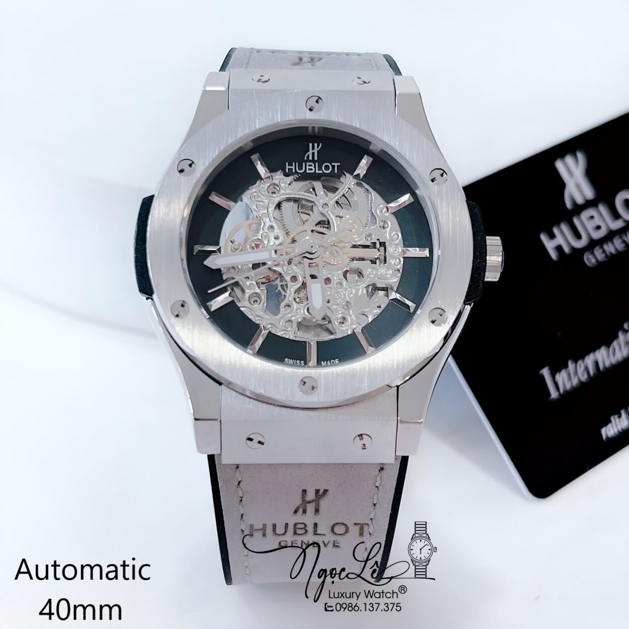 Đồng Hồ Hublot Nam Tự Động Lộ Máy Dây Da Silicon Xám Vỏ Thép Silver Size 41mm