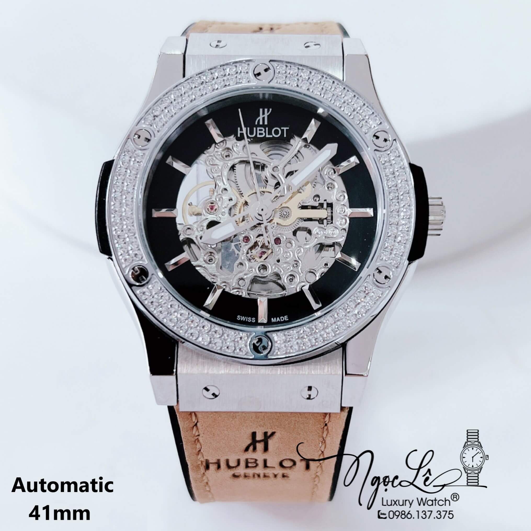 Đồng Hồ Hublot Nam Tự Động Lộ Máy Dây Da Silicon Nâu Đính Đá Bạc Size 41mm