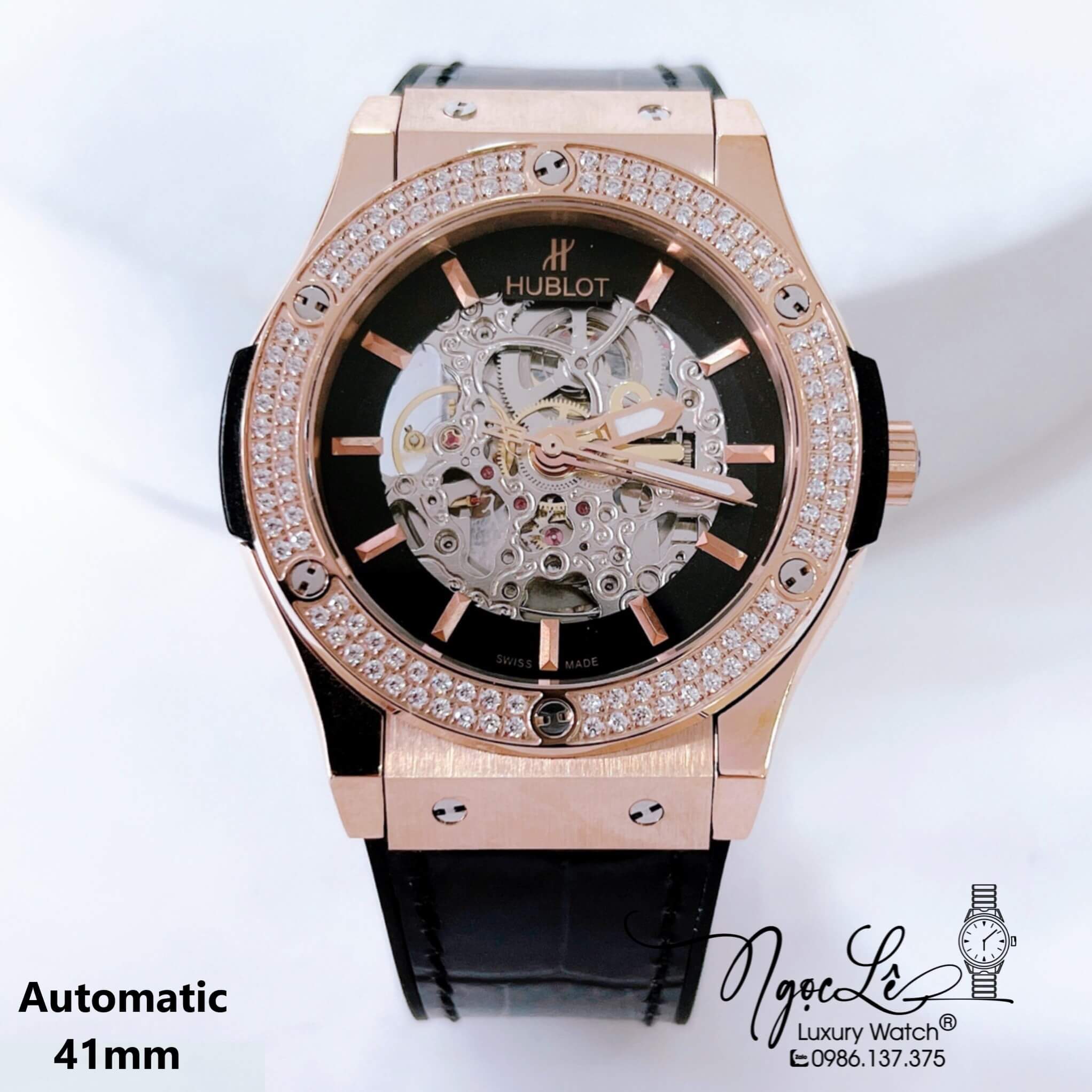 Đồng Hồ Hublot Nam Tự Động Lộ Máy Dây Da Silicon Đen Đính Đá Rose Size 41mm