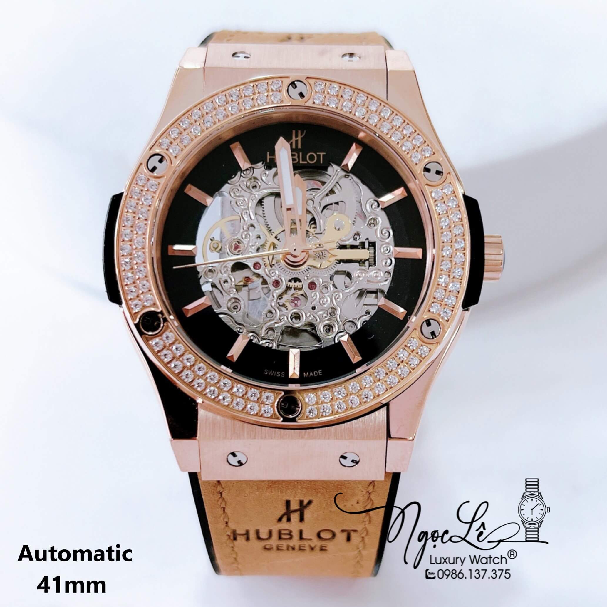 Đồng Hồ Hublot Nam Tự Động Lộ Máy Dây Da Silicon Nâu Đính Đá Rose Size 41mm