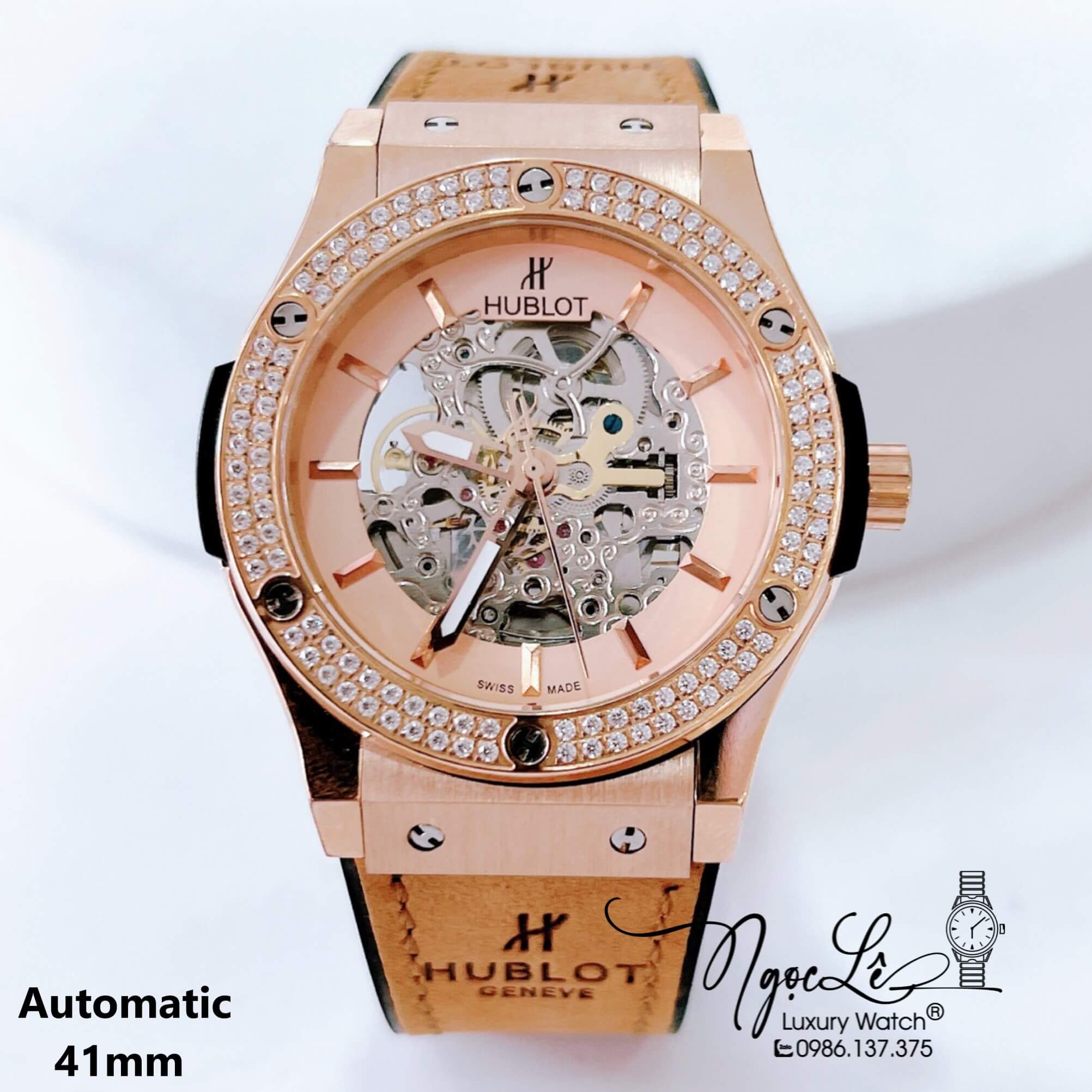 Đồng Hồ Hublot Nam Tự Động Lộ Máy Dây Da Silicon Nâu Đính Đá Rose Size 41mm