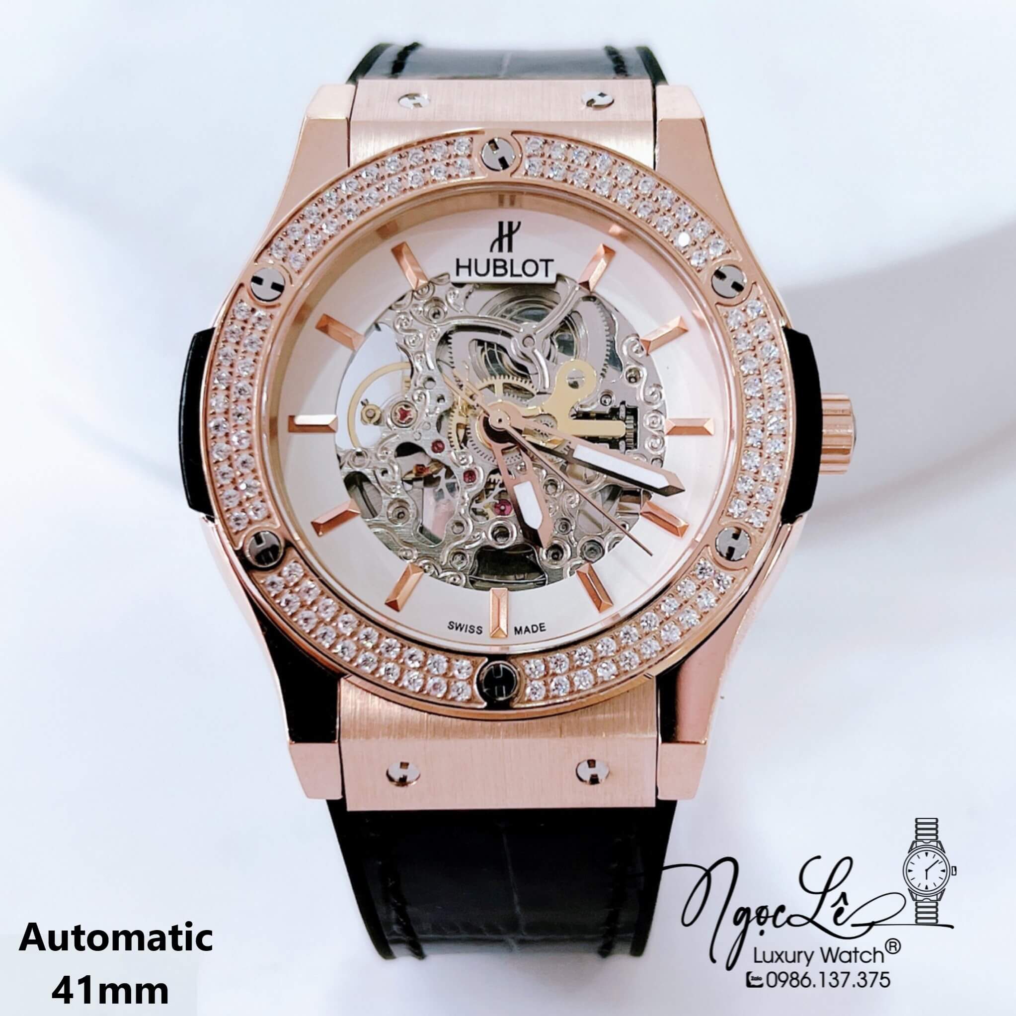 Đồng Hồ Hublot Nam Tự Động Lộ Máy Dây Da Silicon Đen Đính Đá Rose Size 41mm