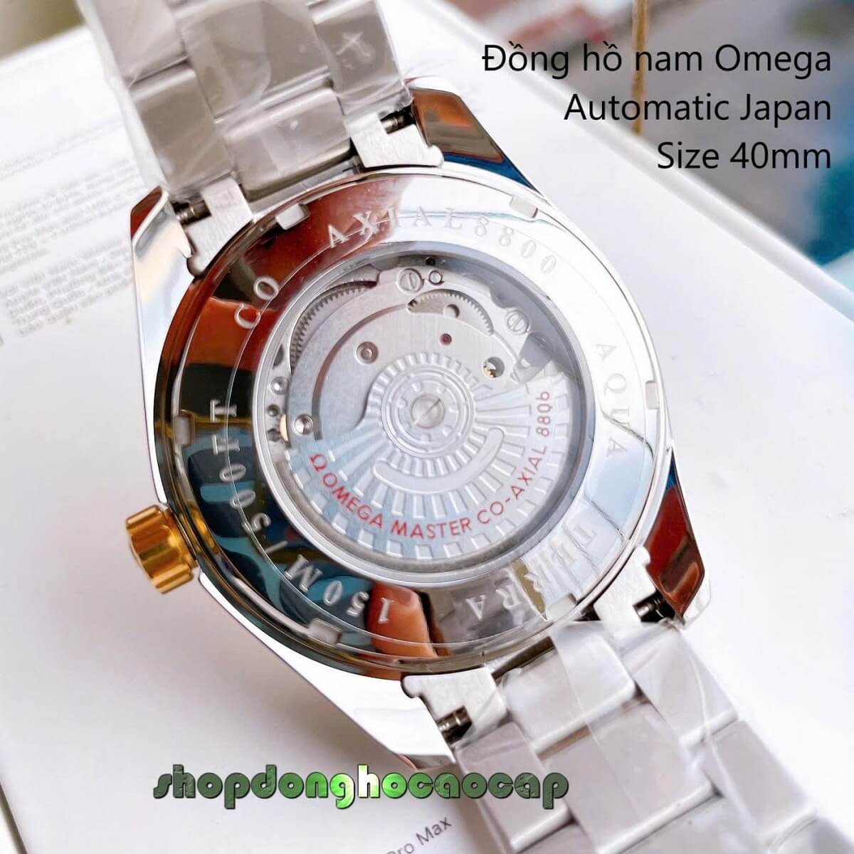 Đồng Hồ Nam Omega Máy Tự Động Nhật 1 Lịch Mặt Trắng Kim Loại Demi Vàng Sapphire Size 40mmm