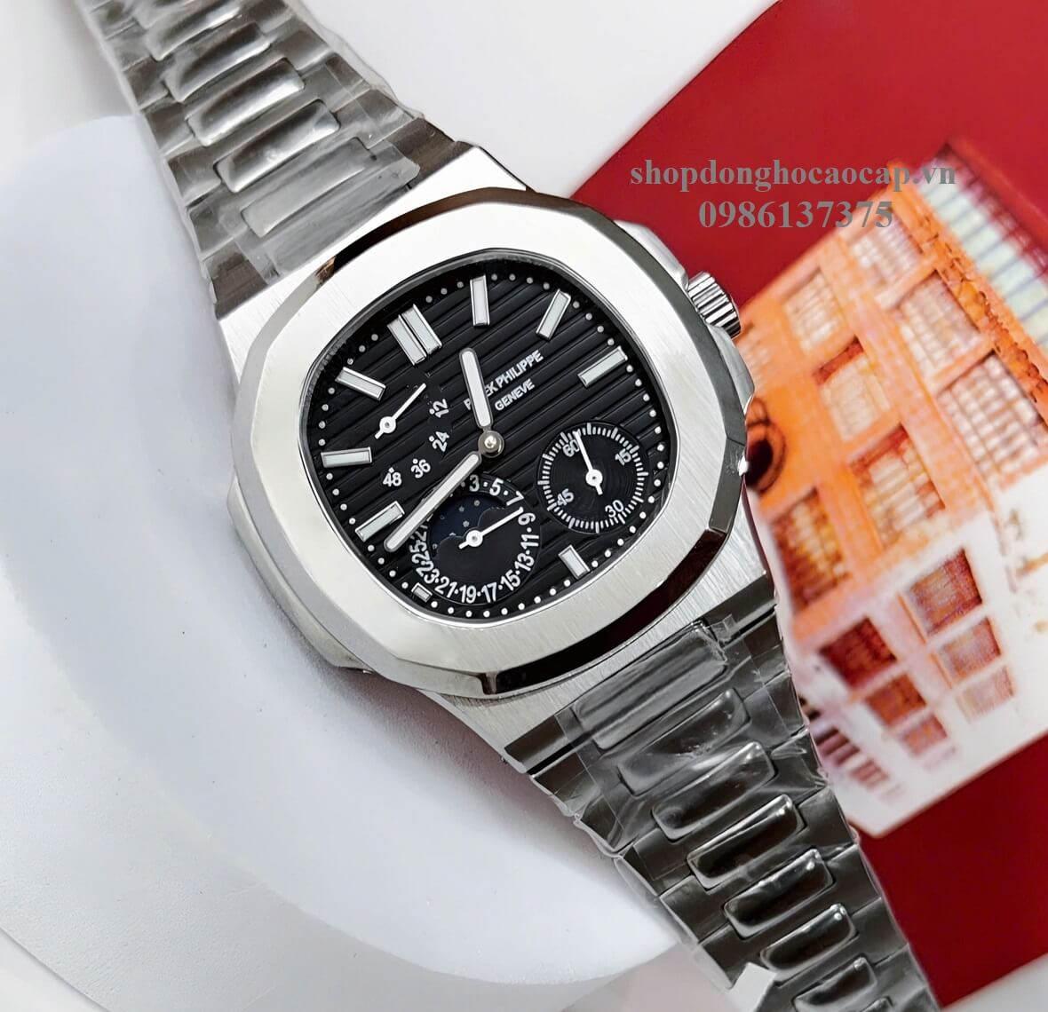 Đồng Hồ Nam Patek Philippe Nautilus 5712 Tự Động Mặt Đen Kim Loại Inox Size 40mm