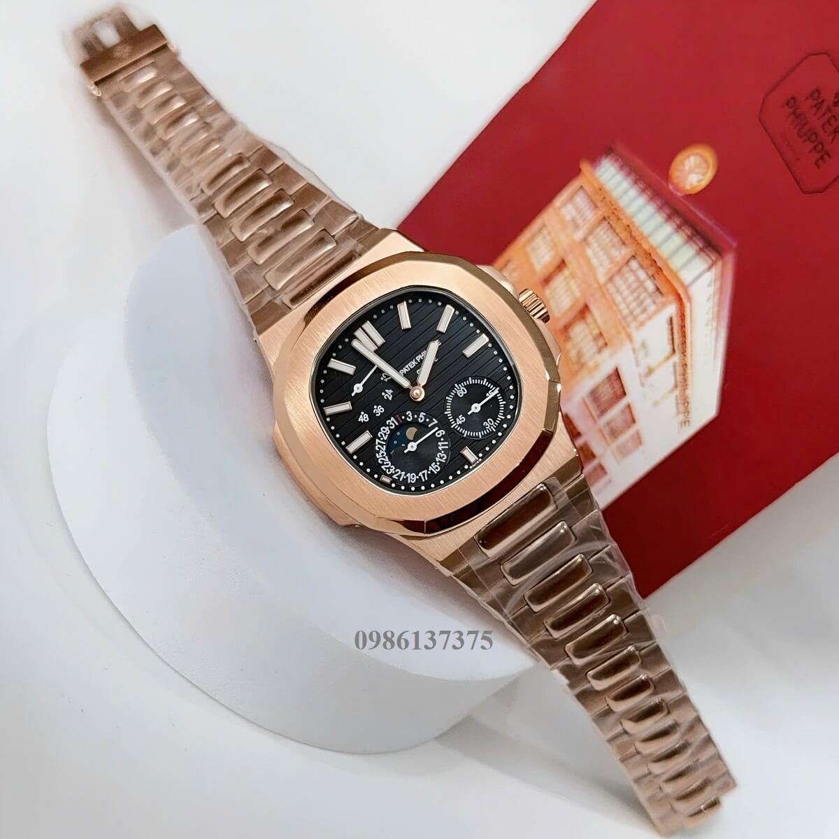 Đồng Hồ Nam Patek Philippe Nautilus 5712 Máy Tự Động Mặt Đen Dây Kim Loại Vàng Hồng Size 40mm