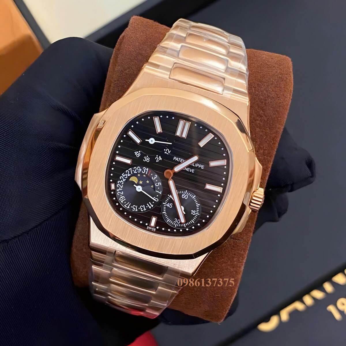 Đồng Hồ Nam Patek Philippe Nautilus 5712 Máy Tự Động Mặt Đen Dây Kim Loại Vàng Hồng Size 40mm