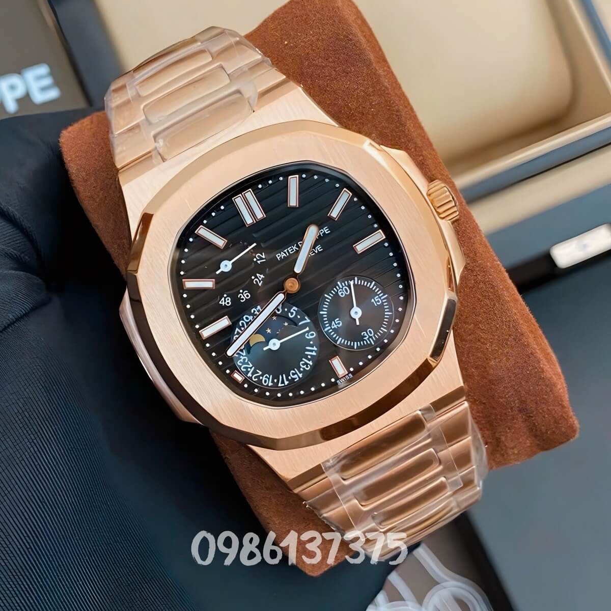 Đồng Hồ Nam Patek Philippe Nautilus 5712 Máy Tự Động Mặt Đen Dây Kim Loại Vàng Hồng Size 40mm