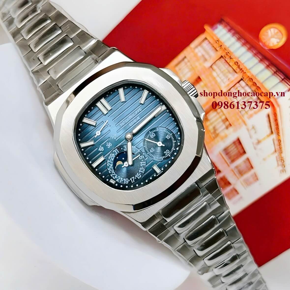 Đồng Hồ Nam Patek Philippe Nautilus 5712 Tự Động Mặt Xanh Dương Kim Loại Inox Size 40mm