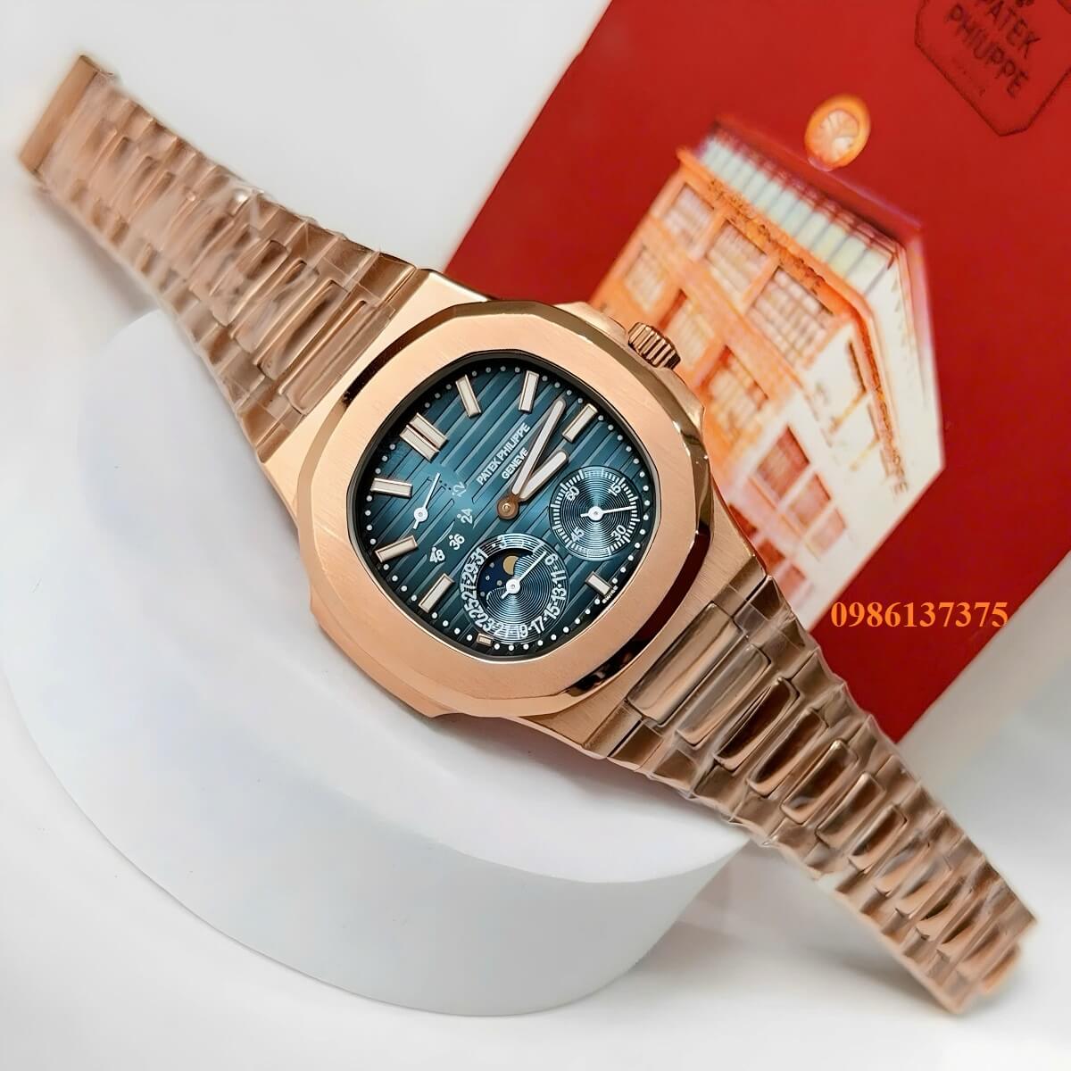 Đồng Hồ Nam Patek Philippe Nautilus 5712 Máy Tự Động Mặt Xanh Dây Kim Loại Vàng Hồng Size 40mm