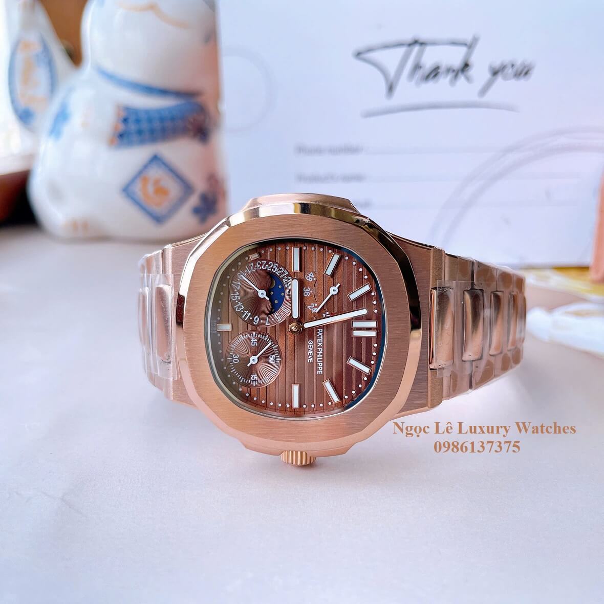 Đồng Hồ Nam Patek Philippe Nautilus Máy Tự Động Mặt Nâu Dây Kim Loại Vàng Hồng Size 40mm