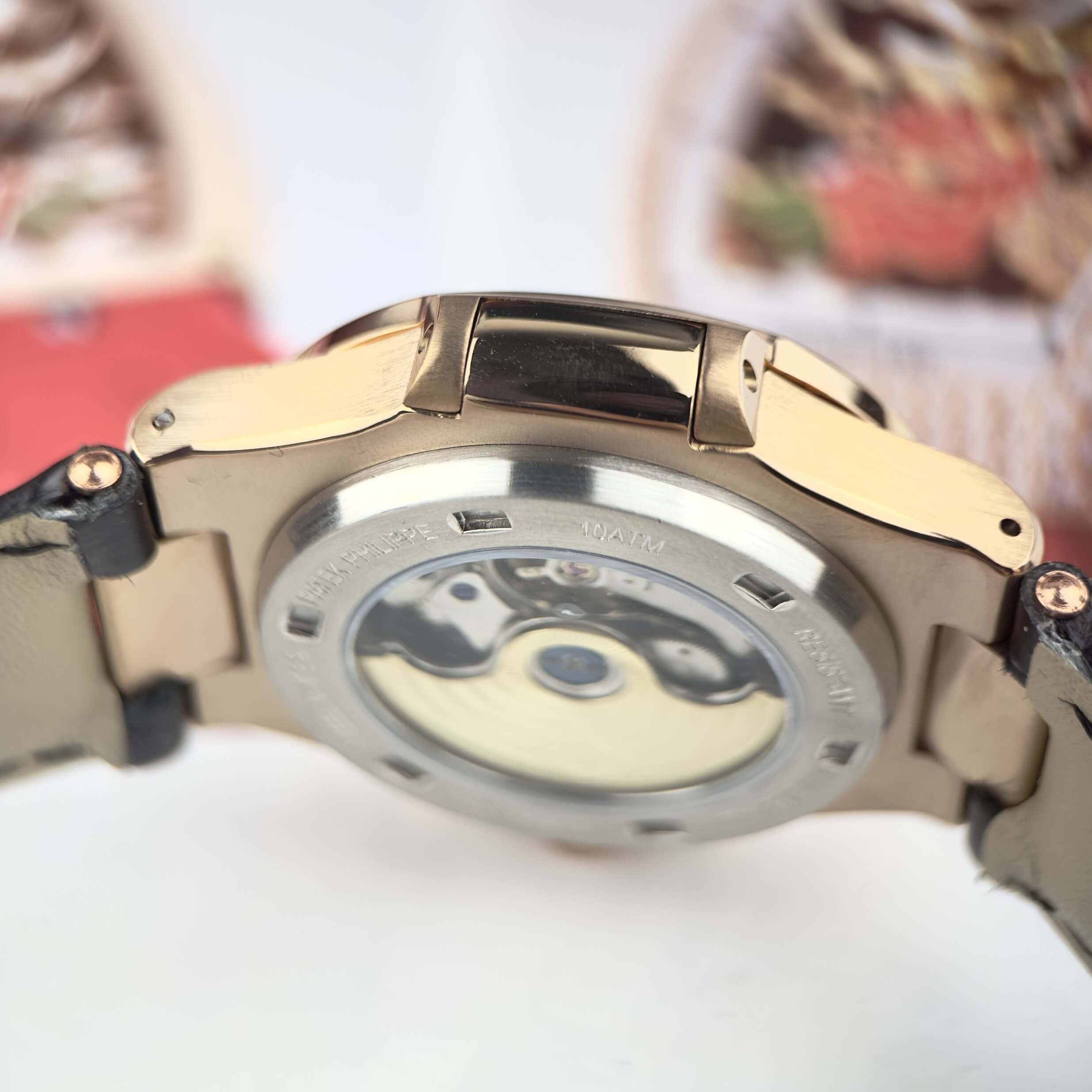 Đồng Hồ Nam Patek Philippe Nautilus Tự Động Dây Da Đen Mặt Đen Đính Đá Rose Size 40mm