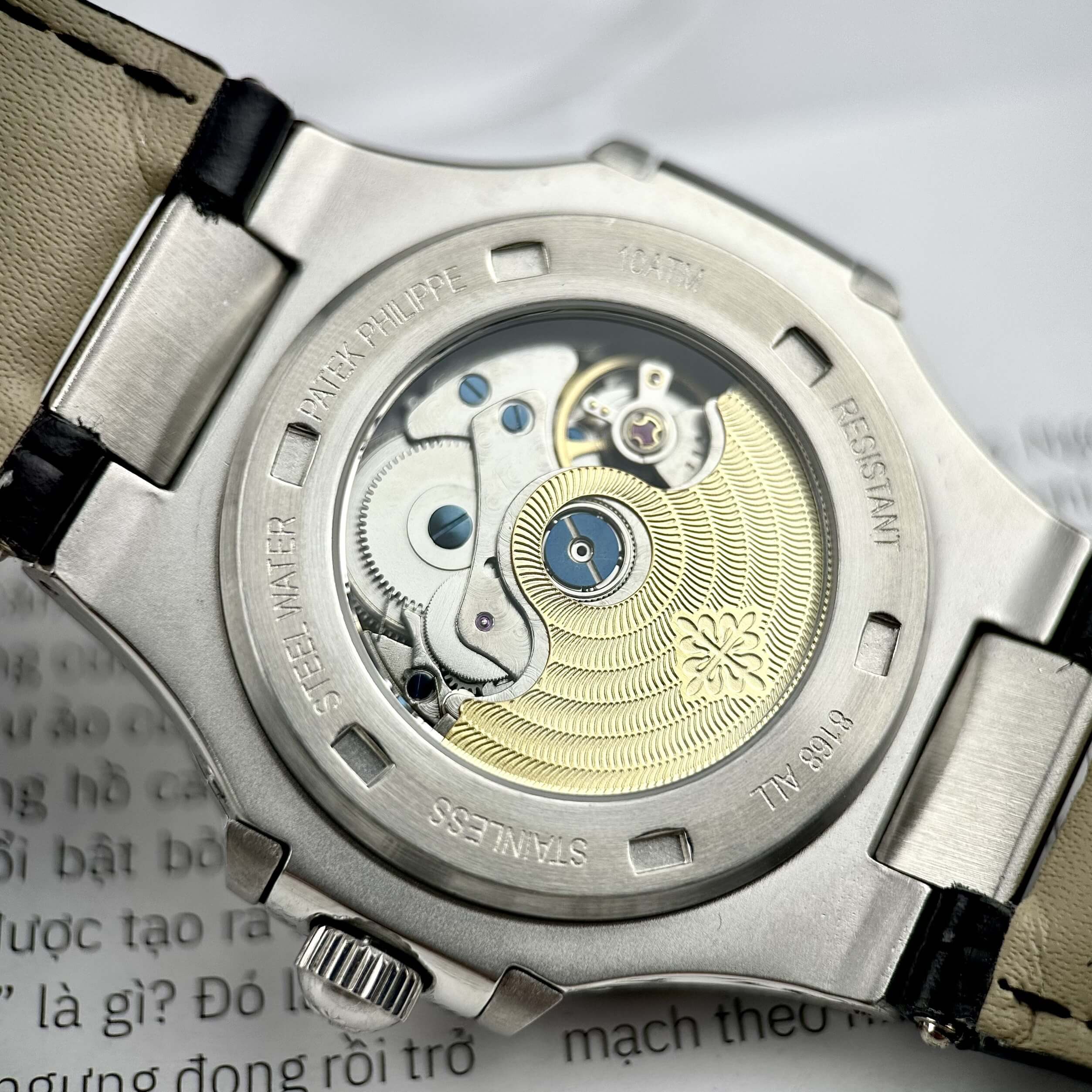 Đồng Hồ Nam Patek Philippe Nautilus Tự Động Dây Da Đen Mặt Đen Đính Đá Silver Size 40mm