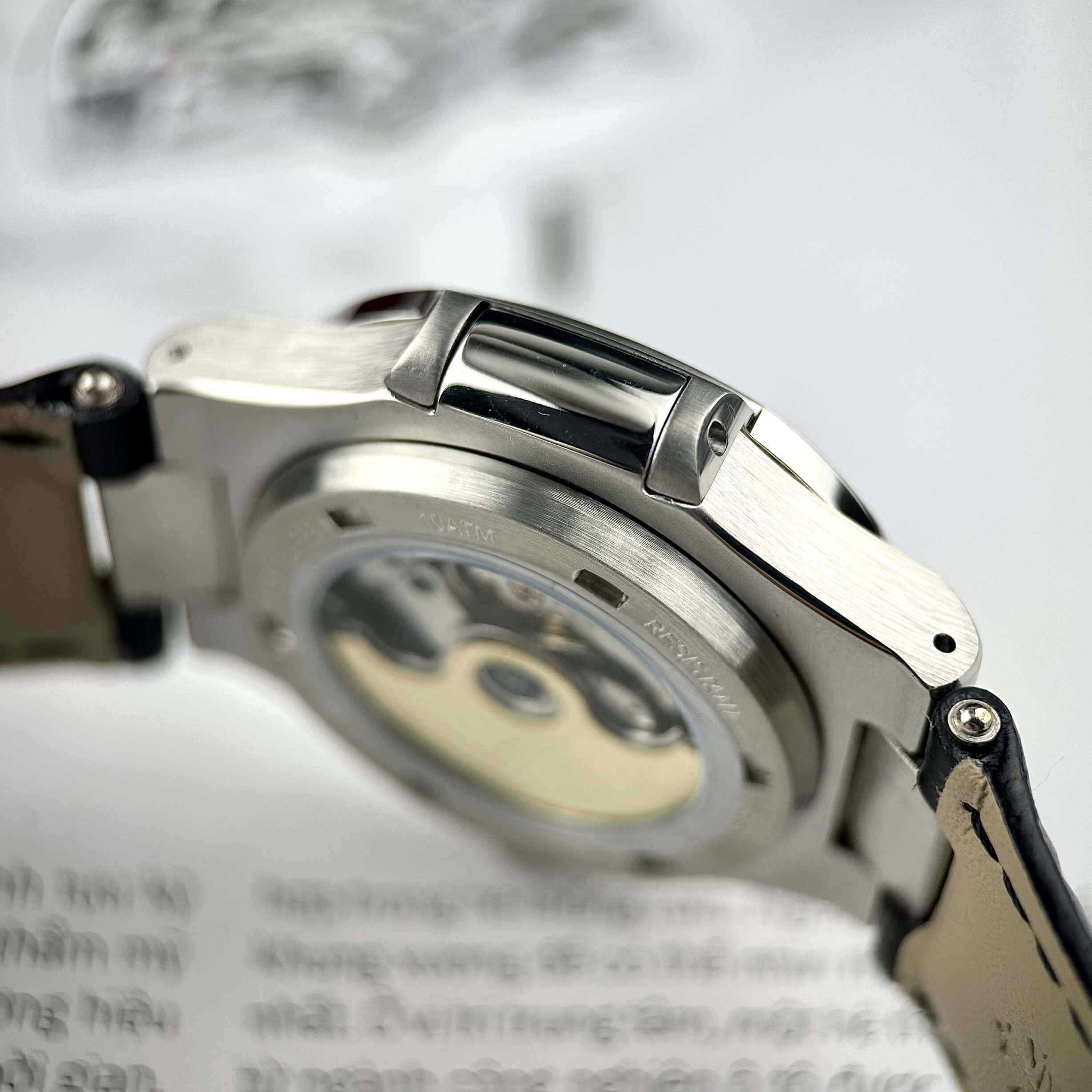 Đồng Hồ Nam Patek Philippe Nautilus Tự Động Dây Da Đen Mặt Đen Đính Đá Silver Size 40mm