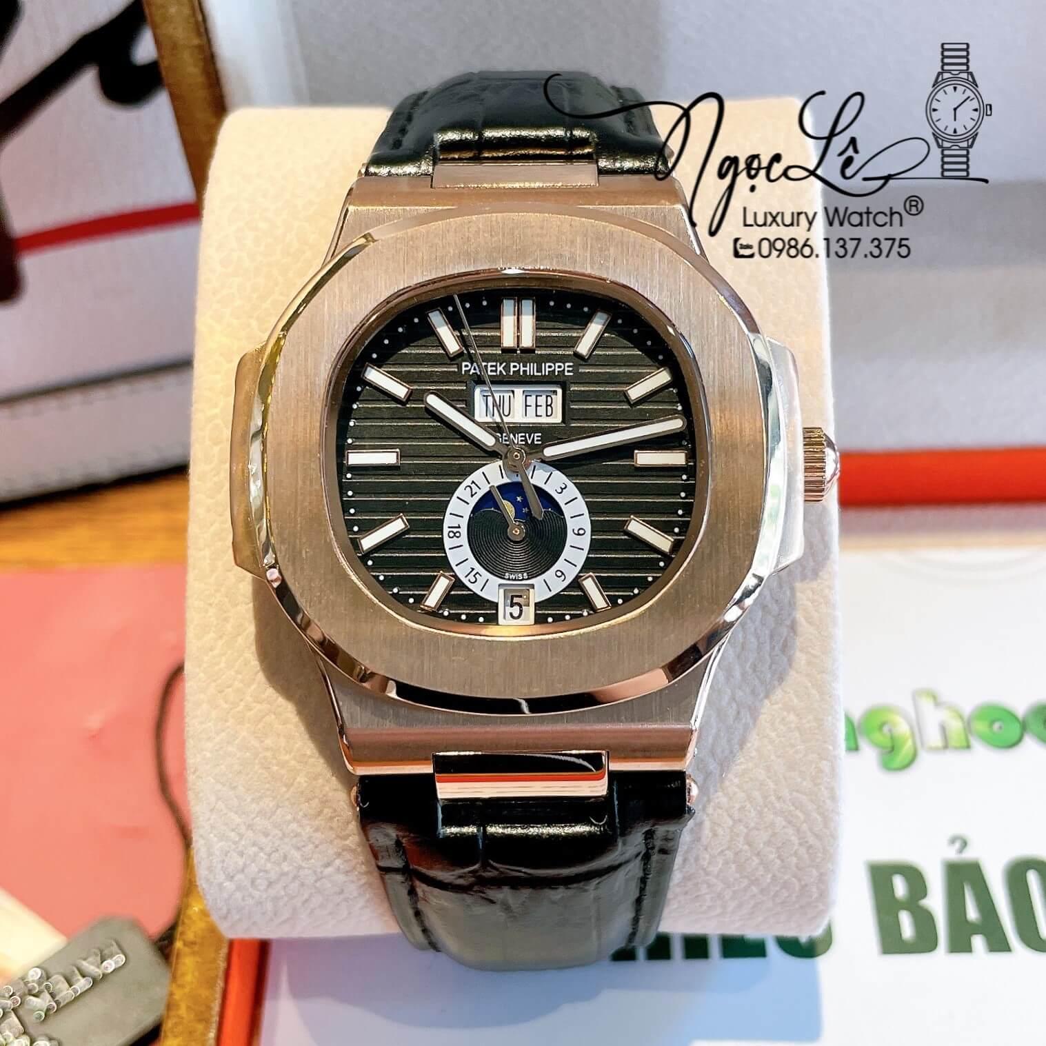 Đồng Hồ Nam Patek Philippe Nautilus Tự Động Dây Da Đen Mặt Đen Vỏ Rose Size 40mm