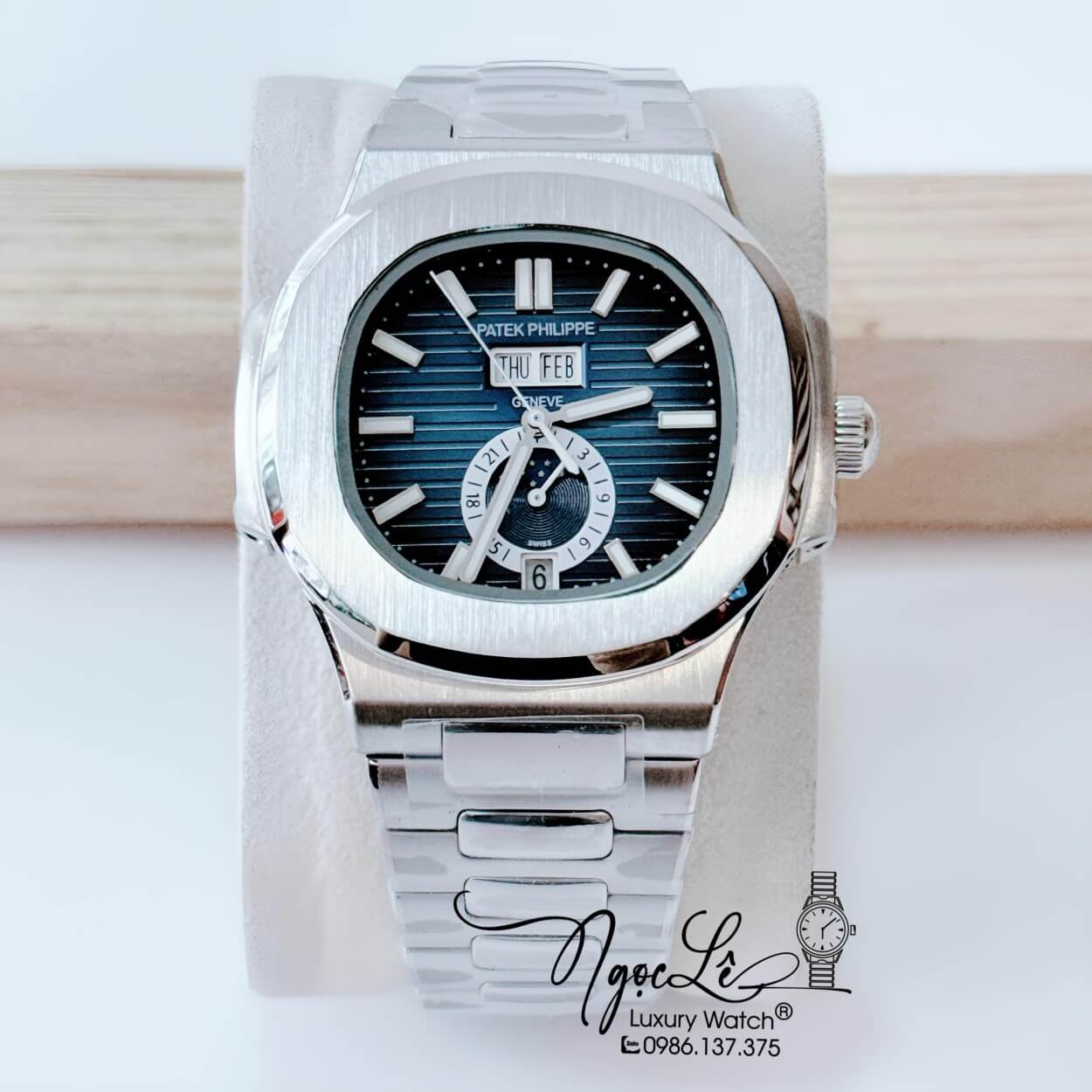 Đồng Hồ Nam Patek Philippe Nautilus Tự Động Dây Kim Loại Silver Mặt Xanh Size 40mm
