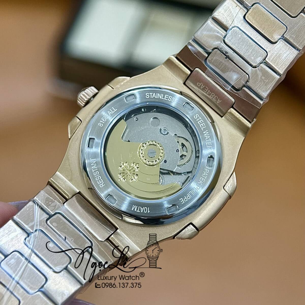Đồng Hồ Nam Patek Philippe Nautilus Tự Động Dây Kim Loại Rose Mặt Nâu Size 40mm