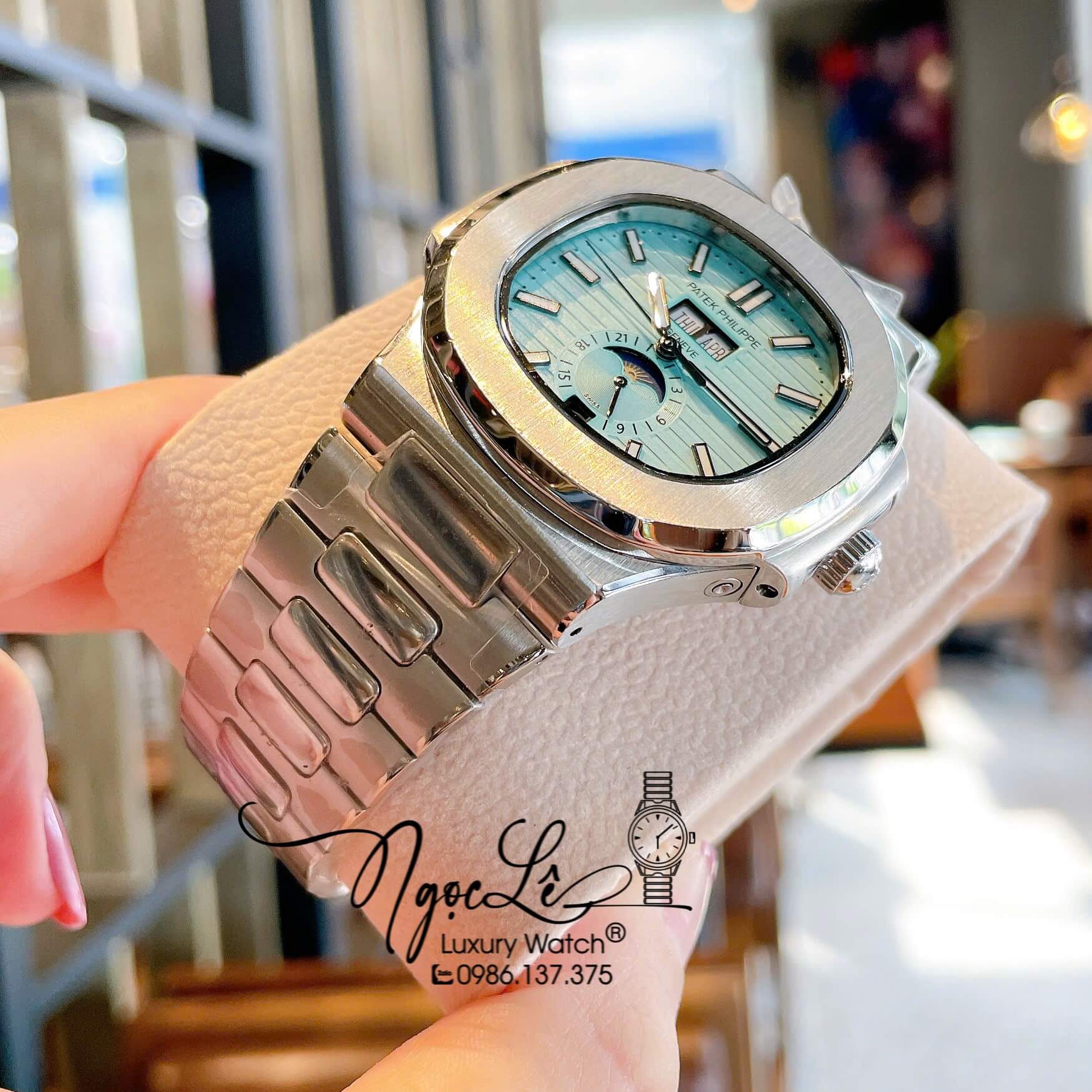 Đồng Hồ Nam Patek Philippe Nautilus Tự Động Dây Kim Loại Silver Mặt Xanh Size 40mm