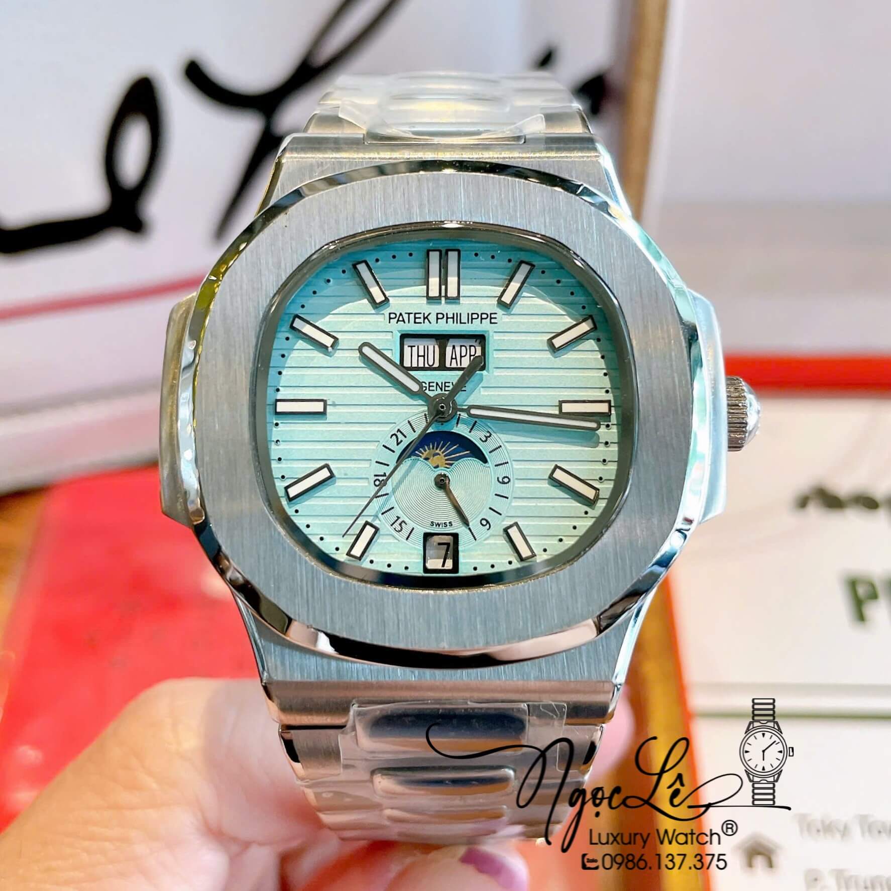 Đồng Hồ Nam Patek Philippe Nautilus Tự Động Dây Kim Loại Silver Mặt Xanh Size 40mm
