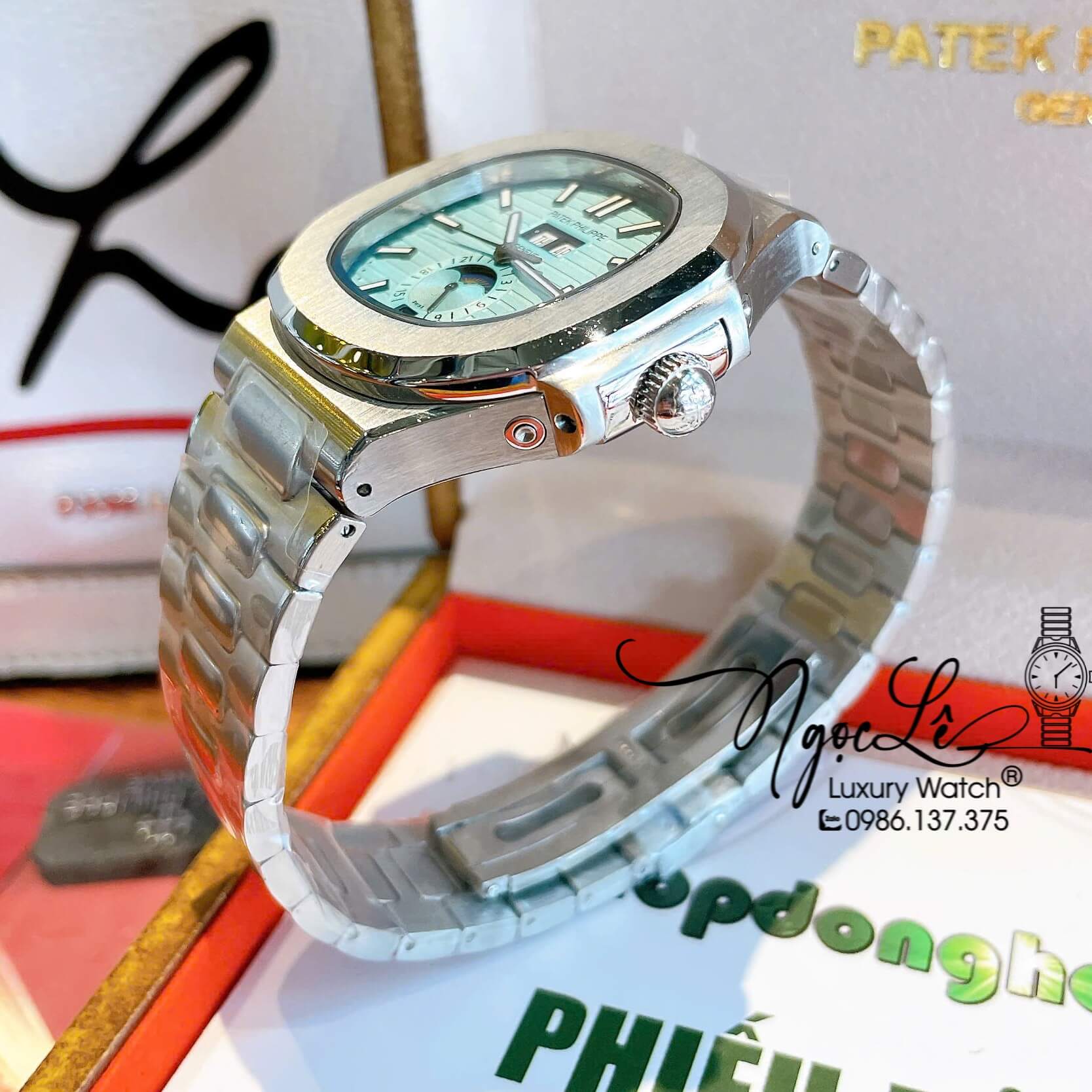 Đồng Hồ Nam Patek Philippe Nautilus Tự Động Dây Kim Loại Silver Mặt Xanh Size 40mm