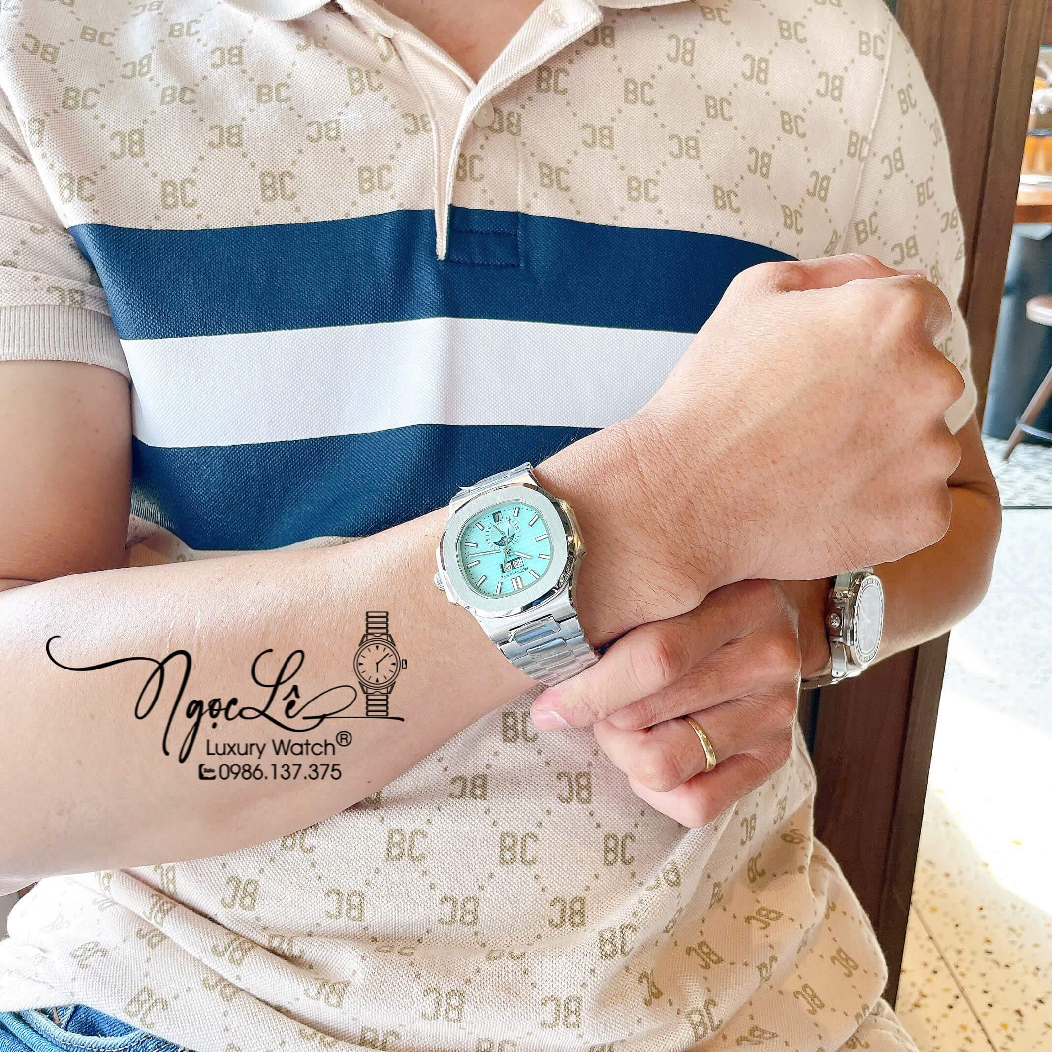Đồng Hồ Nam Patek Philippe Nautilus Tự Động Dây Kim Loại Silver Mặt Xanh Size 40mm