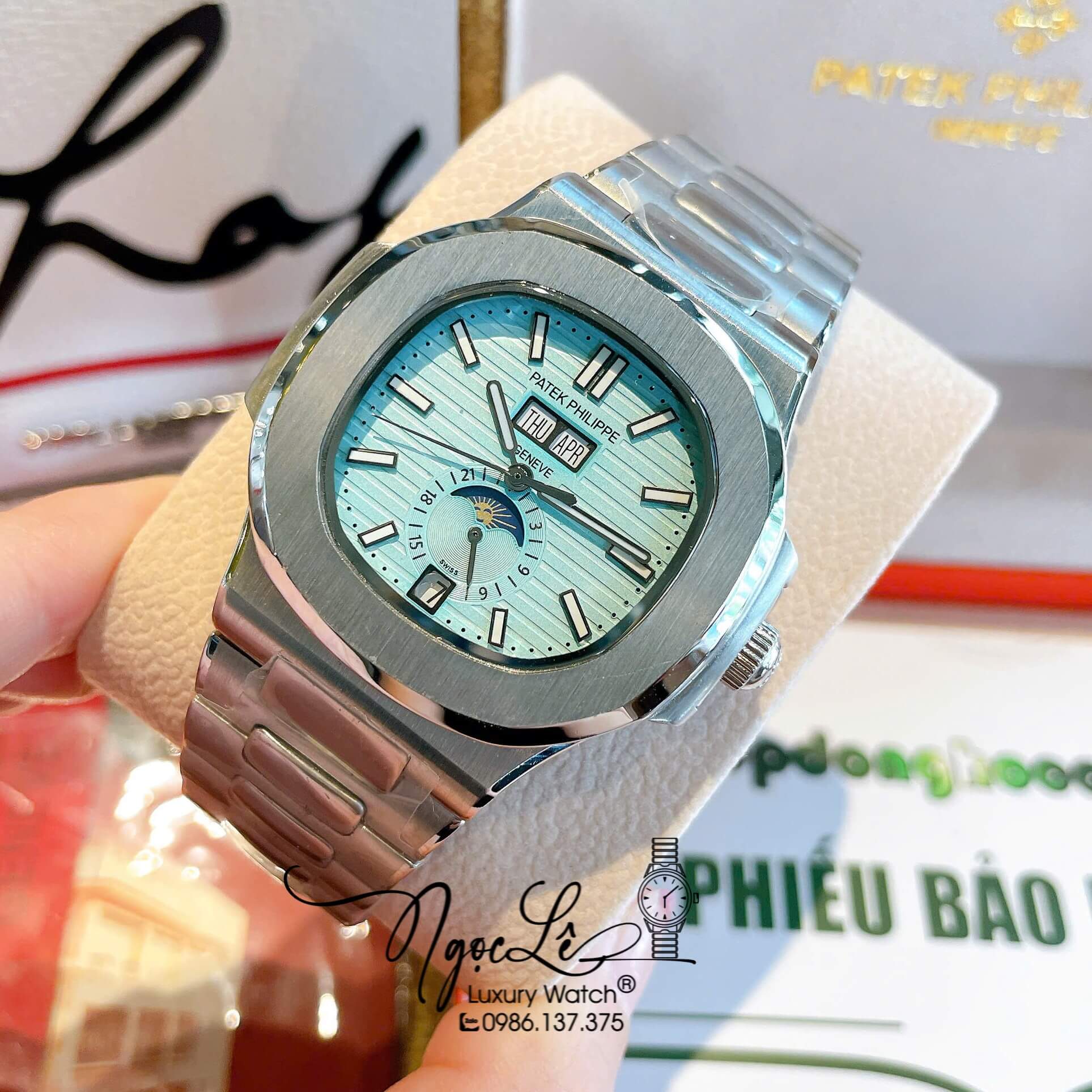 Đồng Hồ Nam Patek Philippe Nautilus Tự Động Dây Kim Loại Silver Mặt Xanh Size 40mm