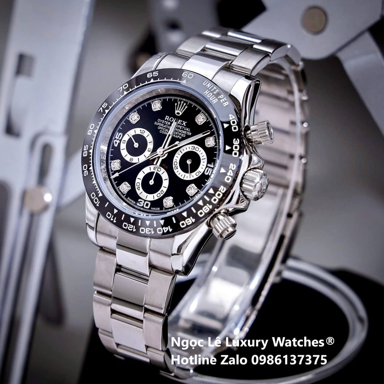 Đồng Hồ Nam Rolex Daytona Automatic Dây Kim Loại Silver Mặt Đen Viền Đen Size 40mm