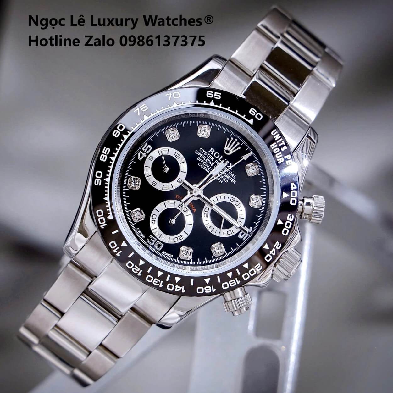 Đồng Hồ Nam Rolex Daytona Automatic Dây Kim Loại Silver Mặt Đen Viền Đen Size 40mm