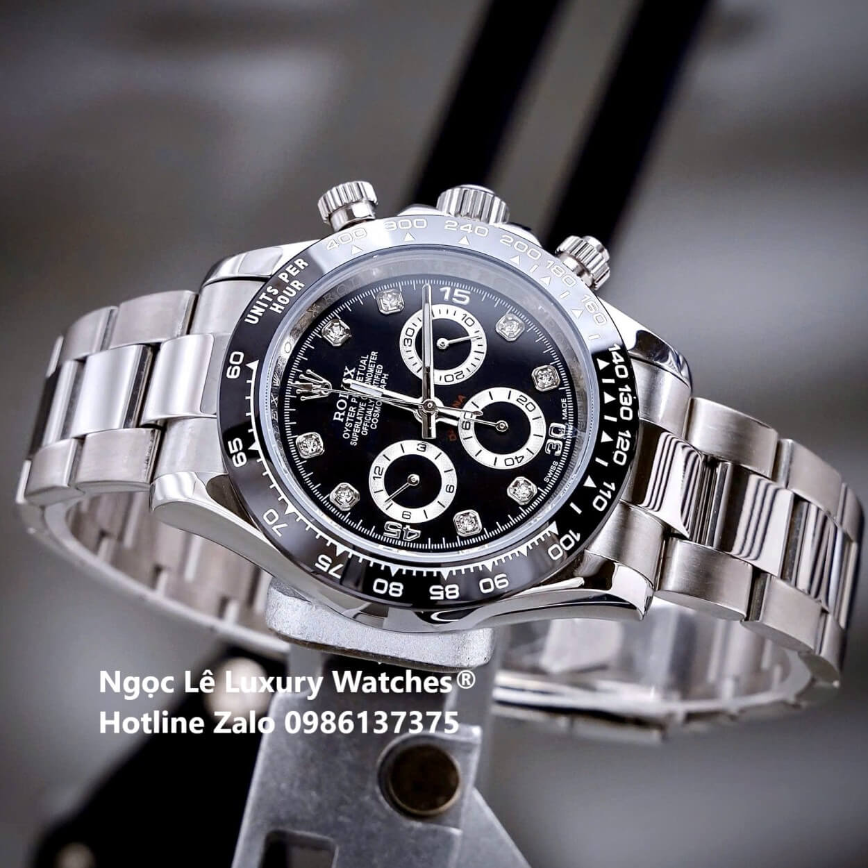 Đồng Hồ Nam Rolex Daytona Automatic Dây Kim Loại Silver Mặt Đen Viền Đen Size 40mm