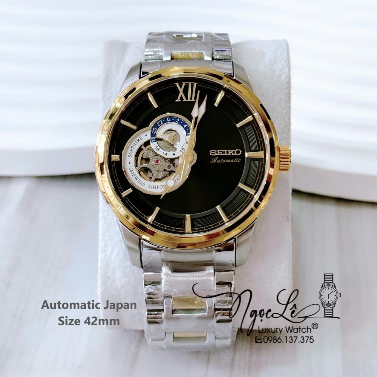 Đồng Hồ Nam Seiko Cơ Tự Động Hở Tim 9h Dây Kim Loại Demi Mặt Đen 42mm