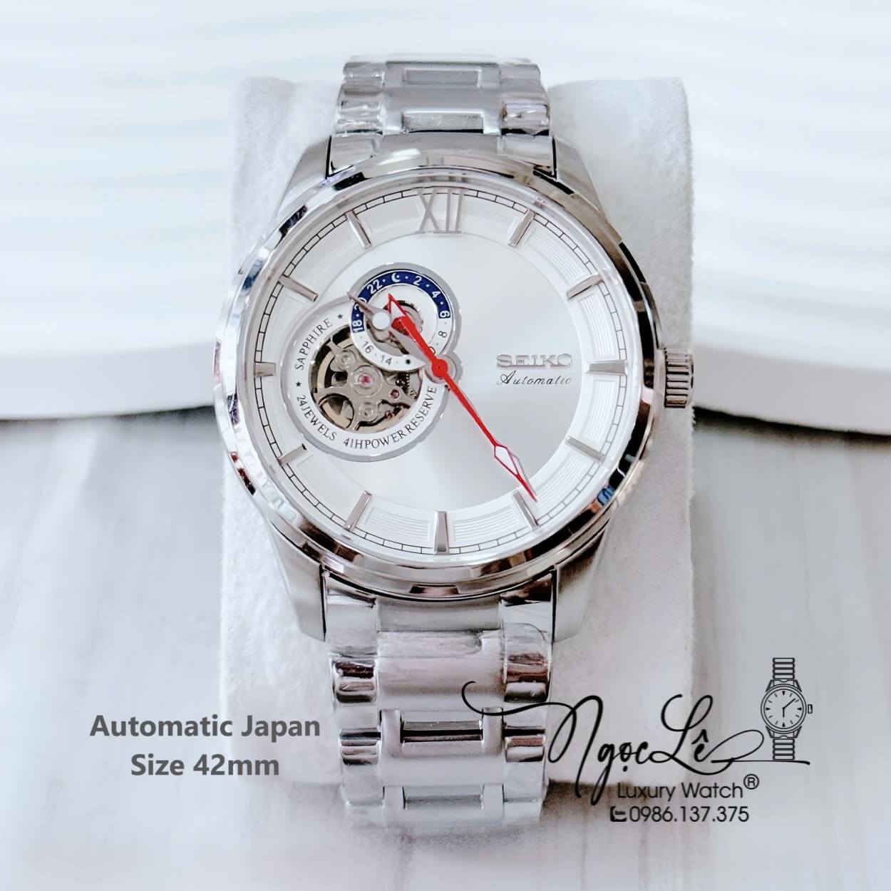 Đồng Hồ Nam Seiko Cơ Tự Động Hở Tim 9h Kim Loại Silver Mặt Trắng 42mm